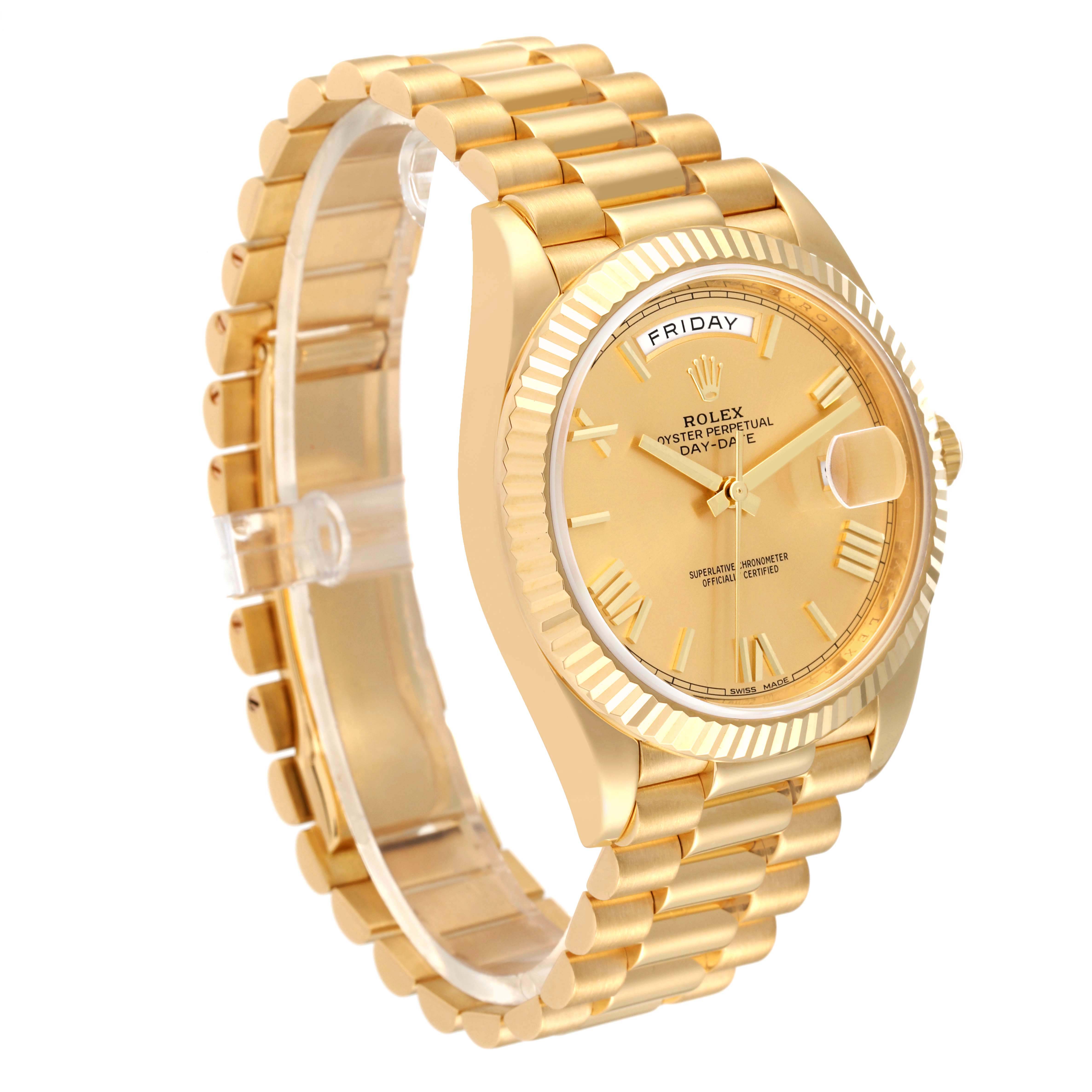 The Rolex President 228238 Men's Yellow Gold Champagne Dial 228238 Men's Yellow Gold Champagne Dial model watch is shown from a front-left angle, displaying the gold bracelet, case, bezel, and dial with the day and date.