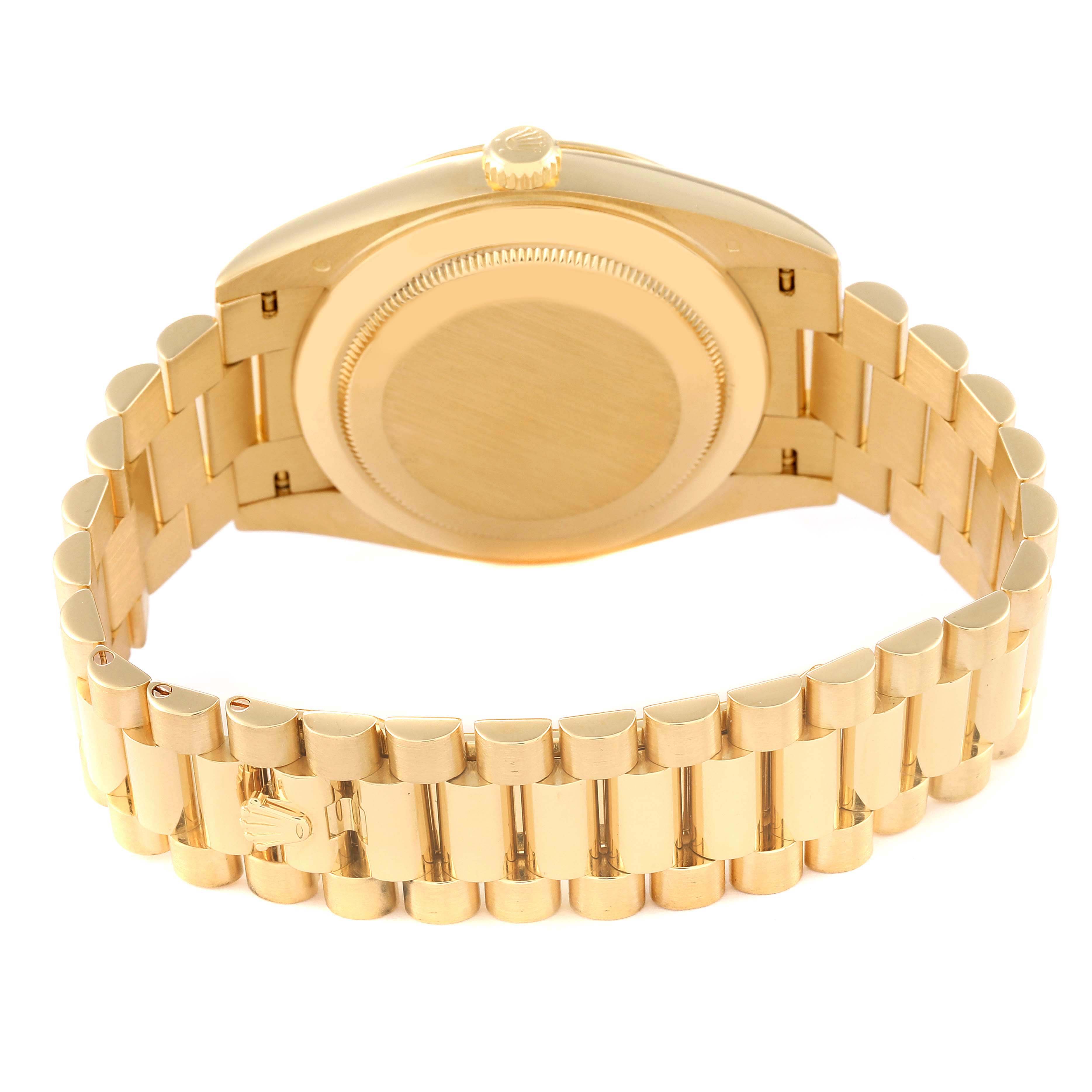 This image shows the back case and bracelet of the Rolex President 228238 Men's Yellow Gold Champagne Dial 228238 Men's Yellow Gold Champagne Dial model watch from a rear angle.