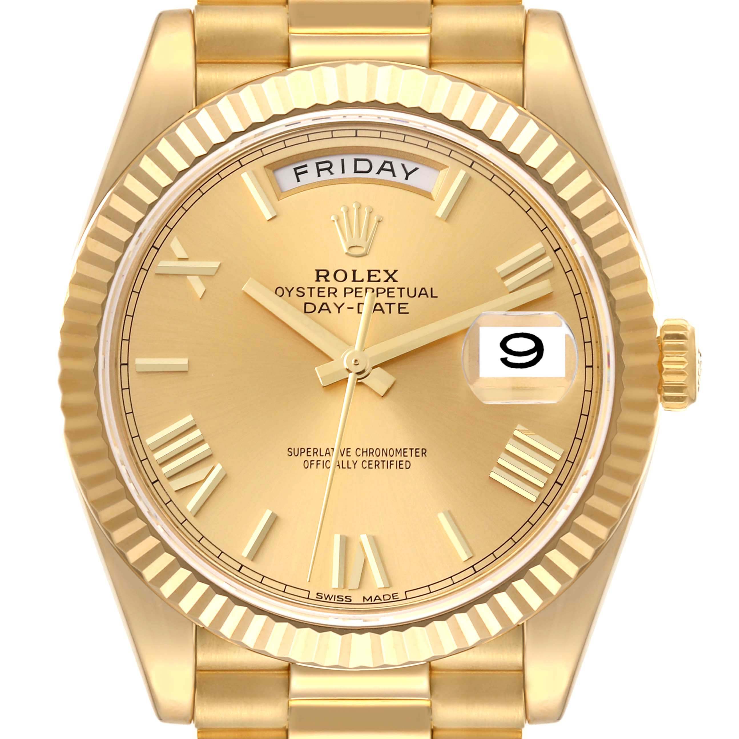 This is a close-up of a Rolex President 228238 Men's Yellow Gold Champagne Dial 228238 Men's Yellow Gold Champagne Dial model watch, showing the dial, hands, date window, and day display.