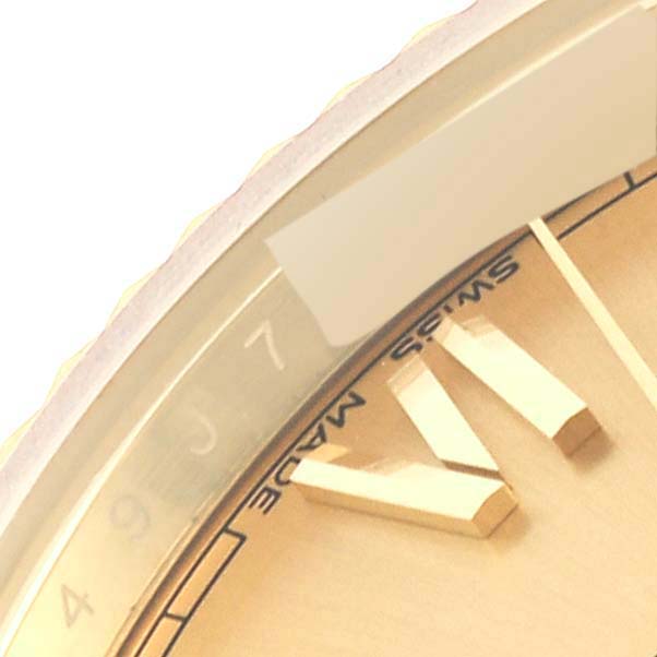 The image shows a close-up of the dial and bezel of a Rolex President 228238 Men's Yellow Gold Champagne Dial 228238 Men's Yellow Gold Champagne Dial model watch, focusing on the hour markers and the edge of the case.