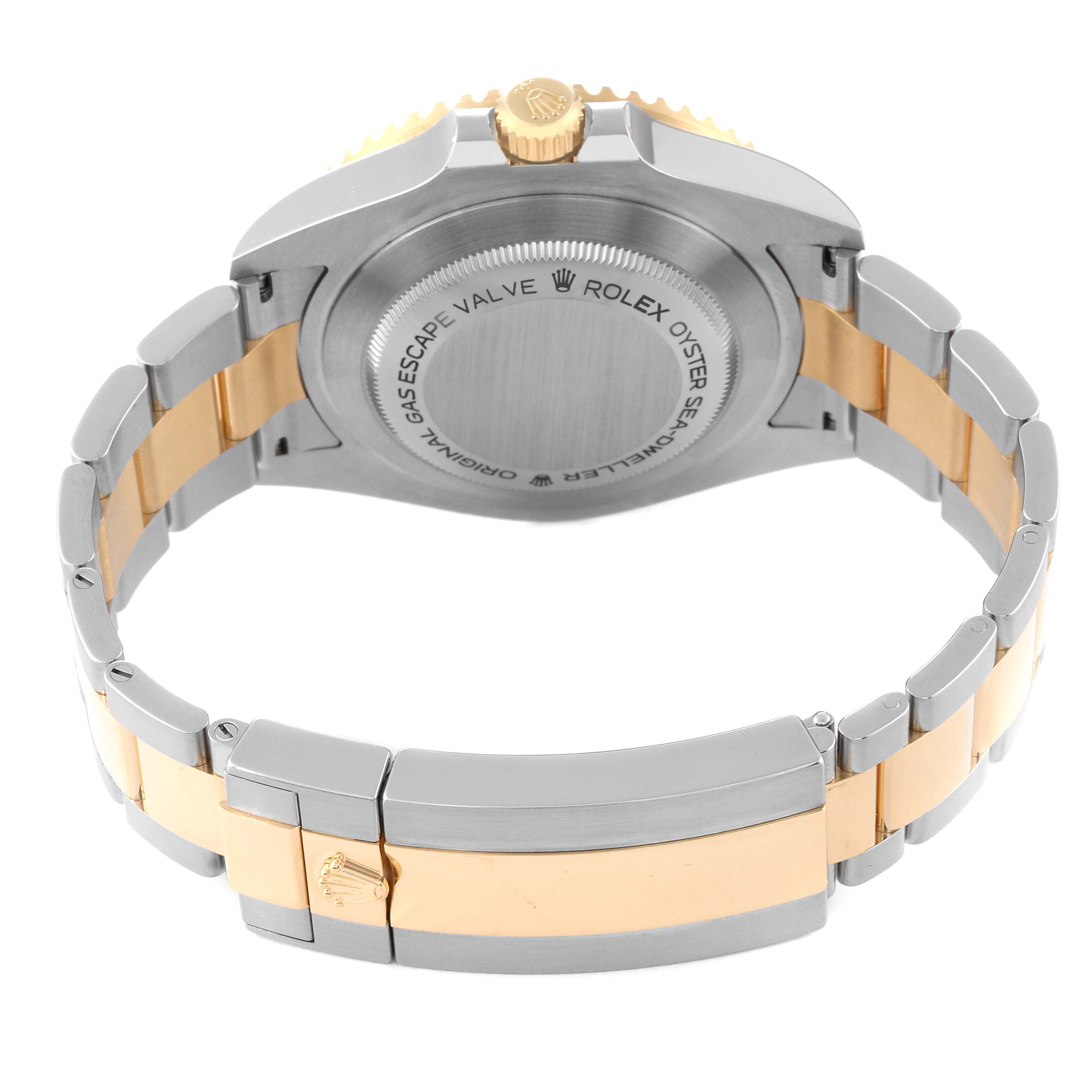 The image shows the back case and bracelet of a Rolex Sea-Dweller 126603 Men's Steel and Gold (two tone) Black Dial 126603 Men's Steel and Gold (two tone) Black Dial, highlighting its two-tone gold and silver design and the gas escape valve.