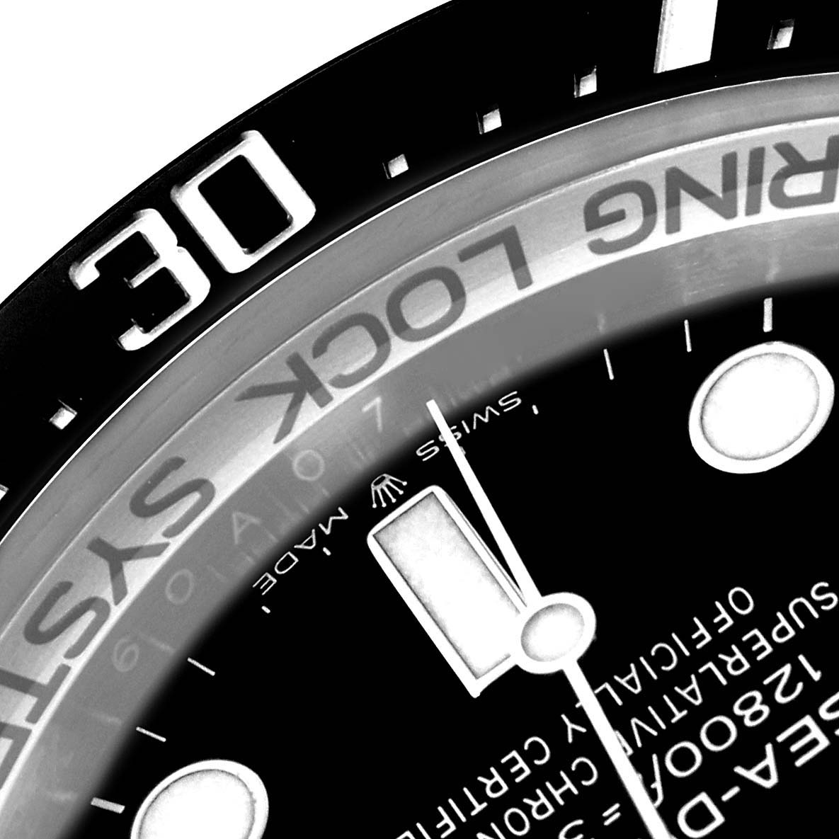 The image shows a close-up angle of the dial and bezel of a Rolex Sea-Dweller 126660 Men's Stainless Steel Black Dial 126660 Men's Stainless Steel Black Dial watch, highlighting the 30-minute mark and part of the face.