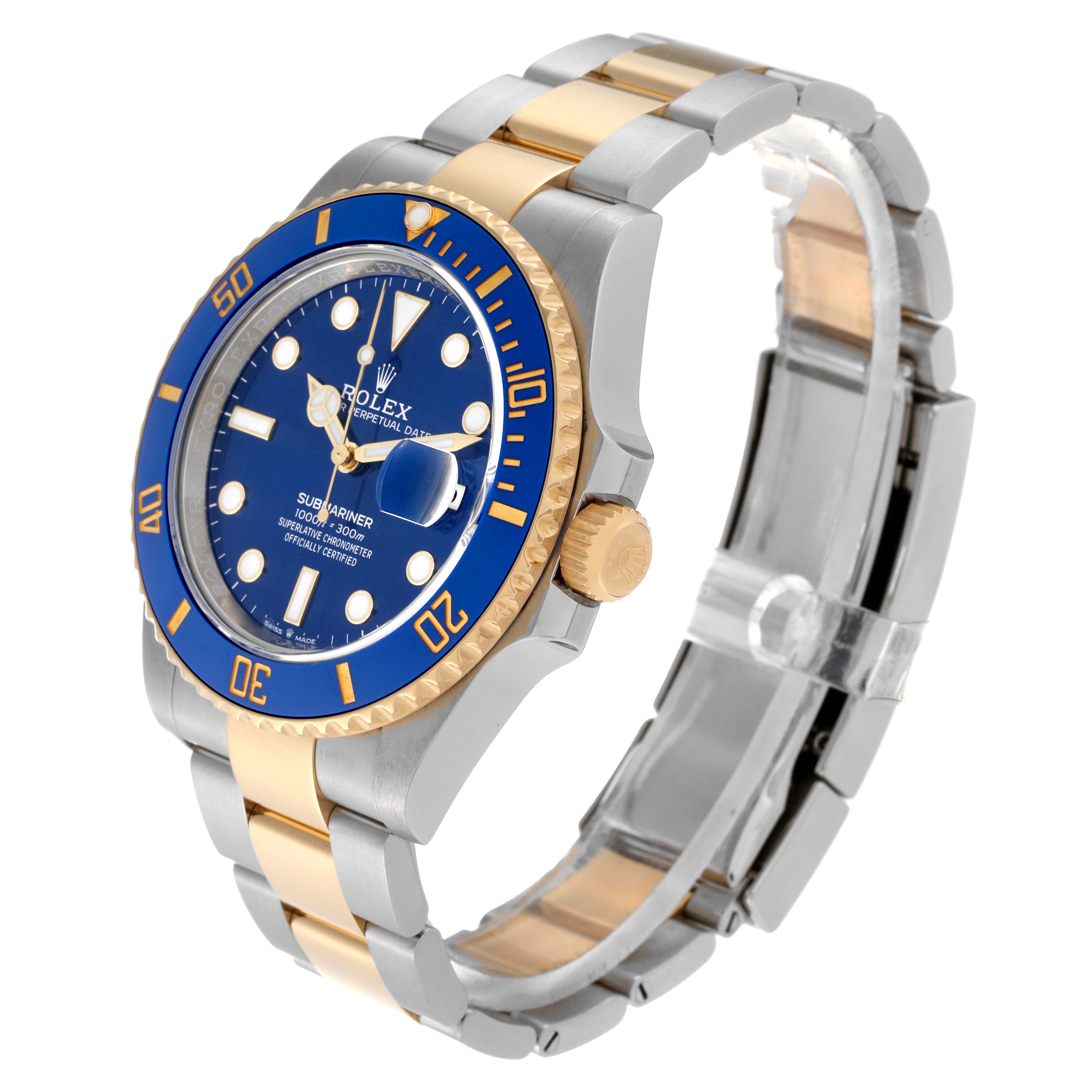 This image shows a side angle of a Rolex Submariner 126613LB Men's Steel and Gold (two tone) Blue Dial 126613LB Men's Steel and Gold (two tone) Blue Dial watch, highlighting the blue dial, bezel, and two-tone bracelet.