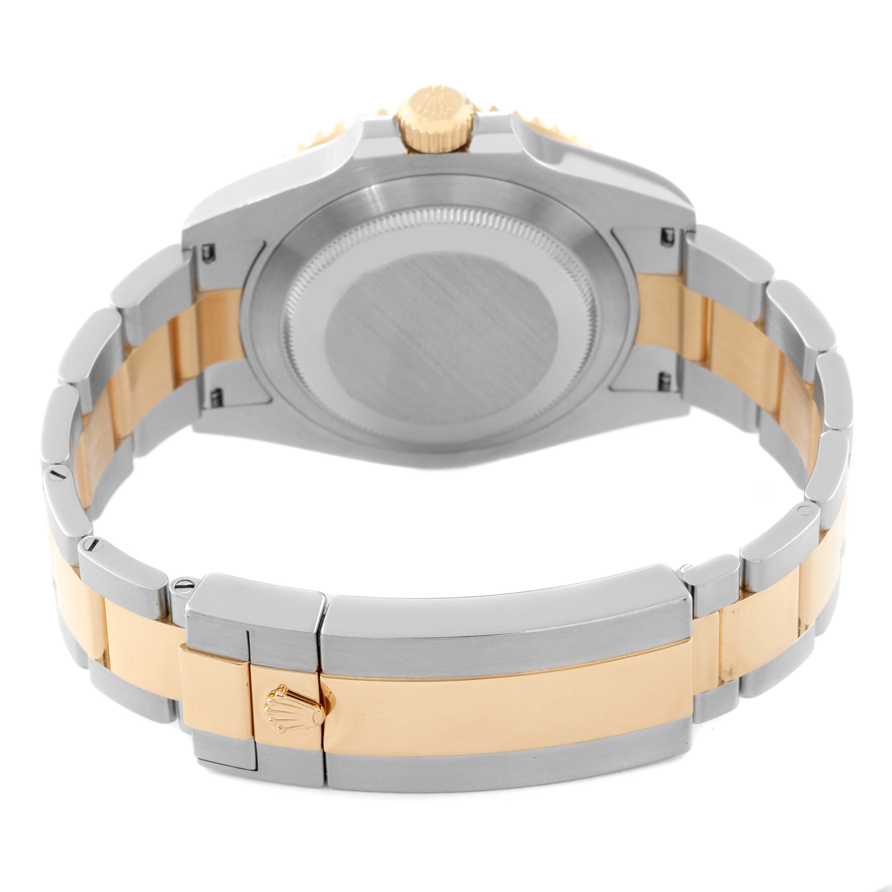 This Rolex Submariner 126613LB Men's Steel and Gold (two tone) Blue Dial 126613LB Men's Steel and Gold (two tone) Blue Dial watch is shown from the back, highlighting its stainless steel and gold bracelet and the clasp.