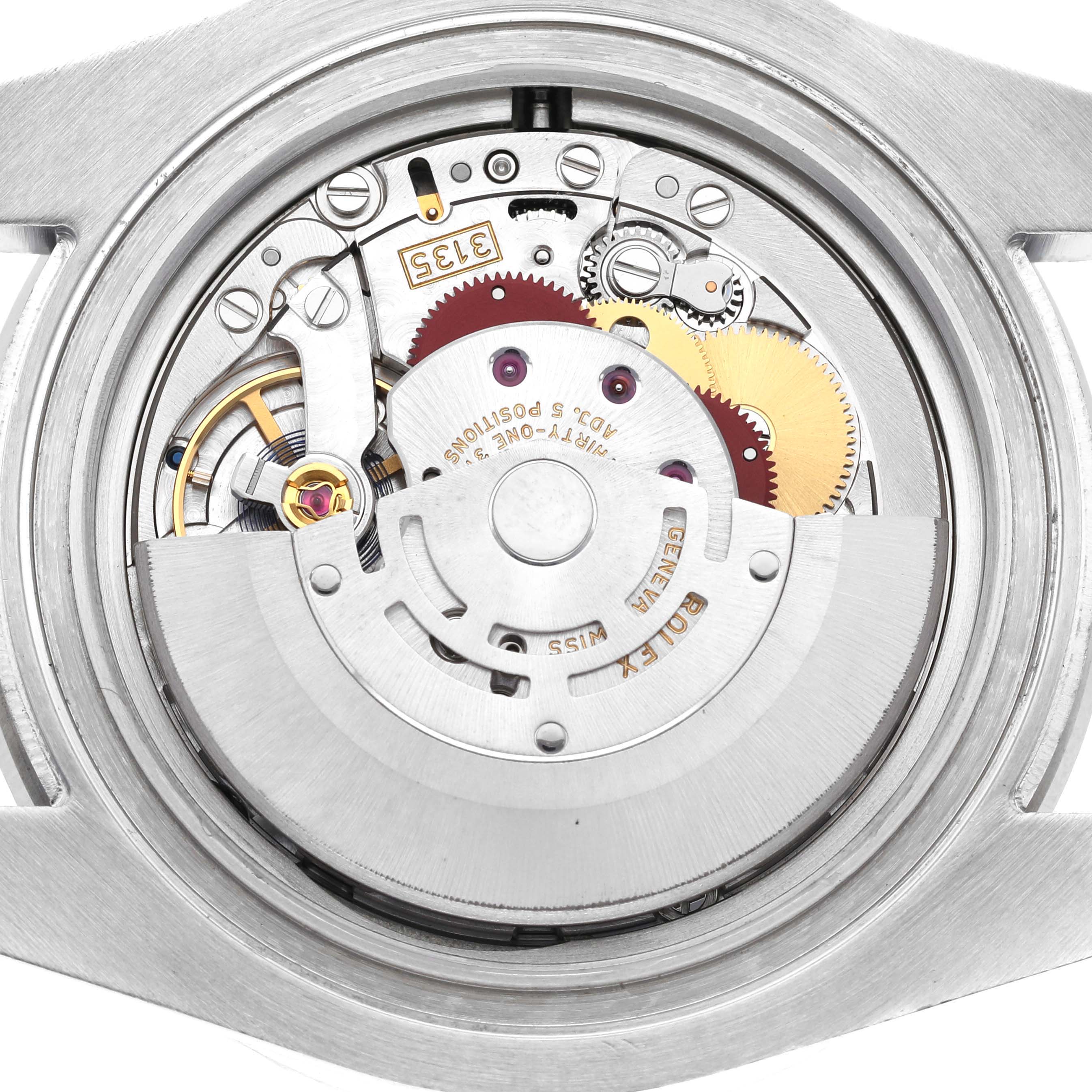 This image shows the internal mechanism and movement of the Rolex Submariner 116610LV Men's Stainless Steel Green Dial 116610LV Men's Stainless Steel Green Dial watch, viewed from the back.