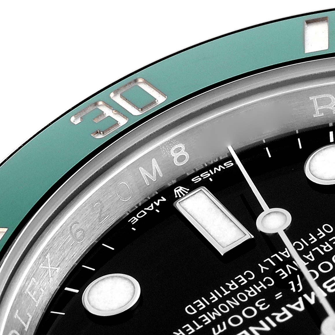 This close-up image shows the bezel, part of the dial, and text on a Rolex Submariner 126610LV Men
s Stainless Steel Black Dial 126610LV Men
s Stainless Steel Black Dial watch.