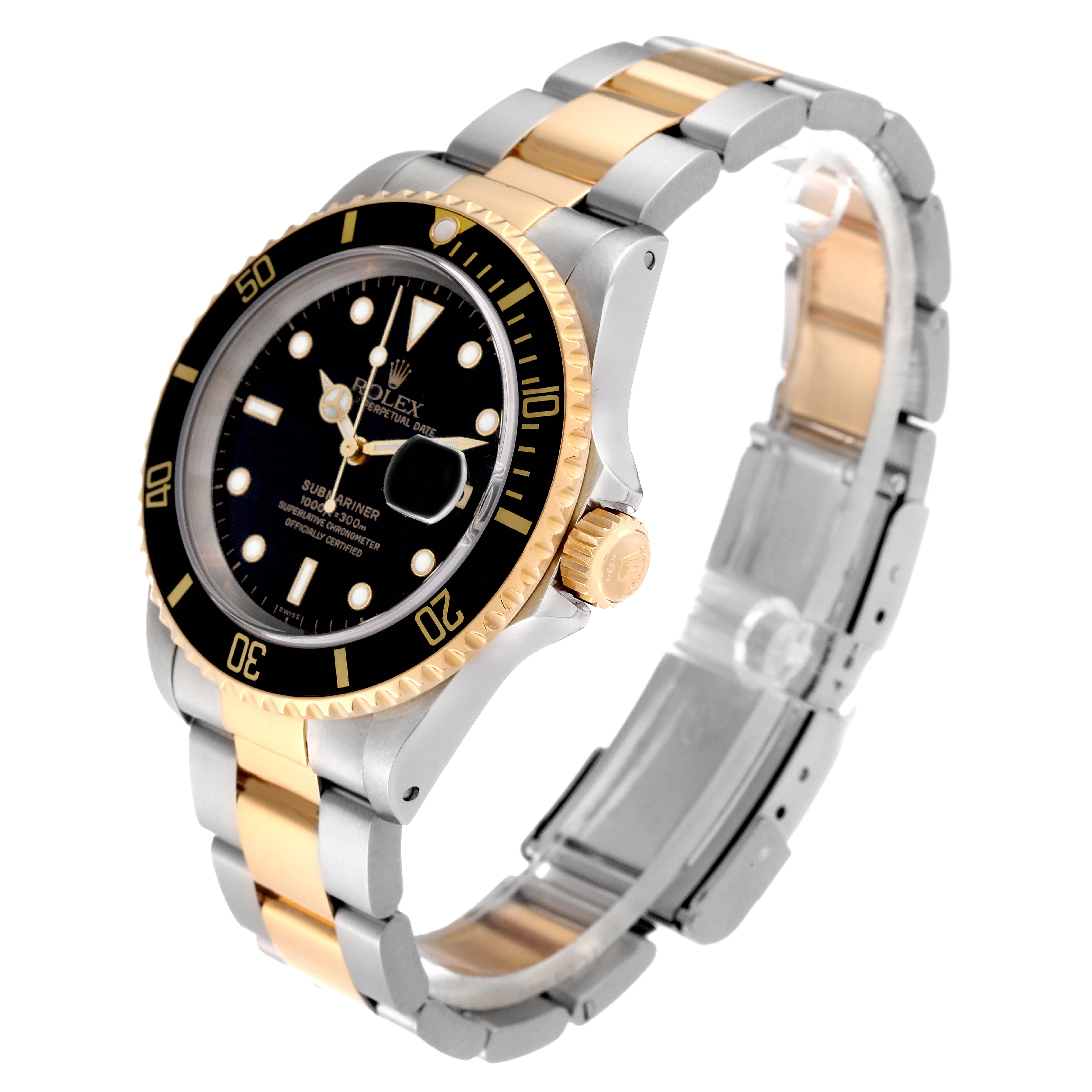 This Rolex Submariner 16613 Men's Steel and Gold (two tone) Black Dial 16613 Men's Steel and Gold (two tone) Black Dial watch is shown from an angled top-down view, showcasing its black dial, gold bezel, and two-tone metal bracelet.