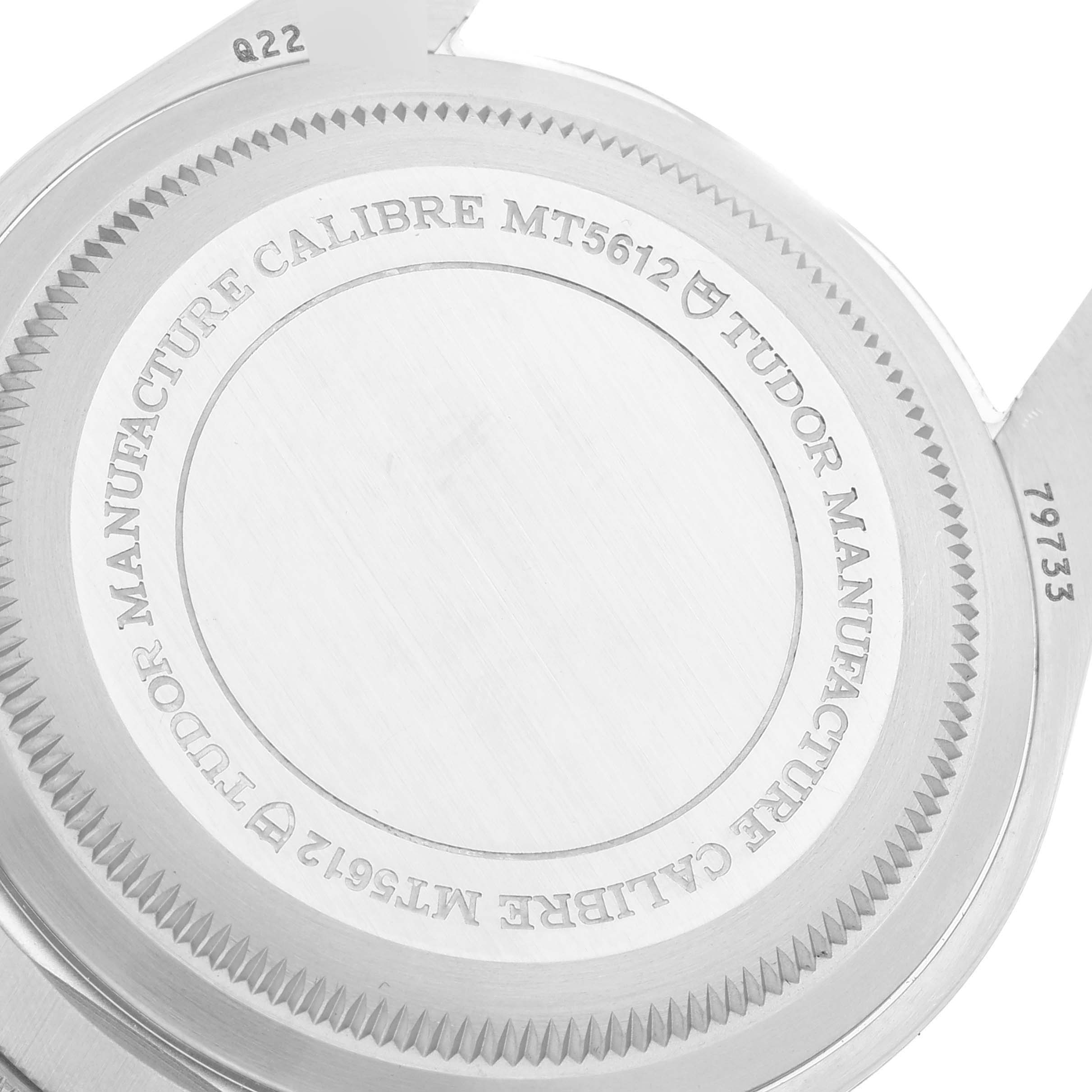 The image shows the case back of a Tudor Heritage Black Bay 79733 Men's Steel and Gold (two tone) Champagne Dial 79733 Men's Steel and Gold (two tone) Champagne Dial watch, specifically highlighting the Tudor Manufacture Calibre MT5612.