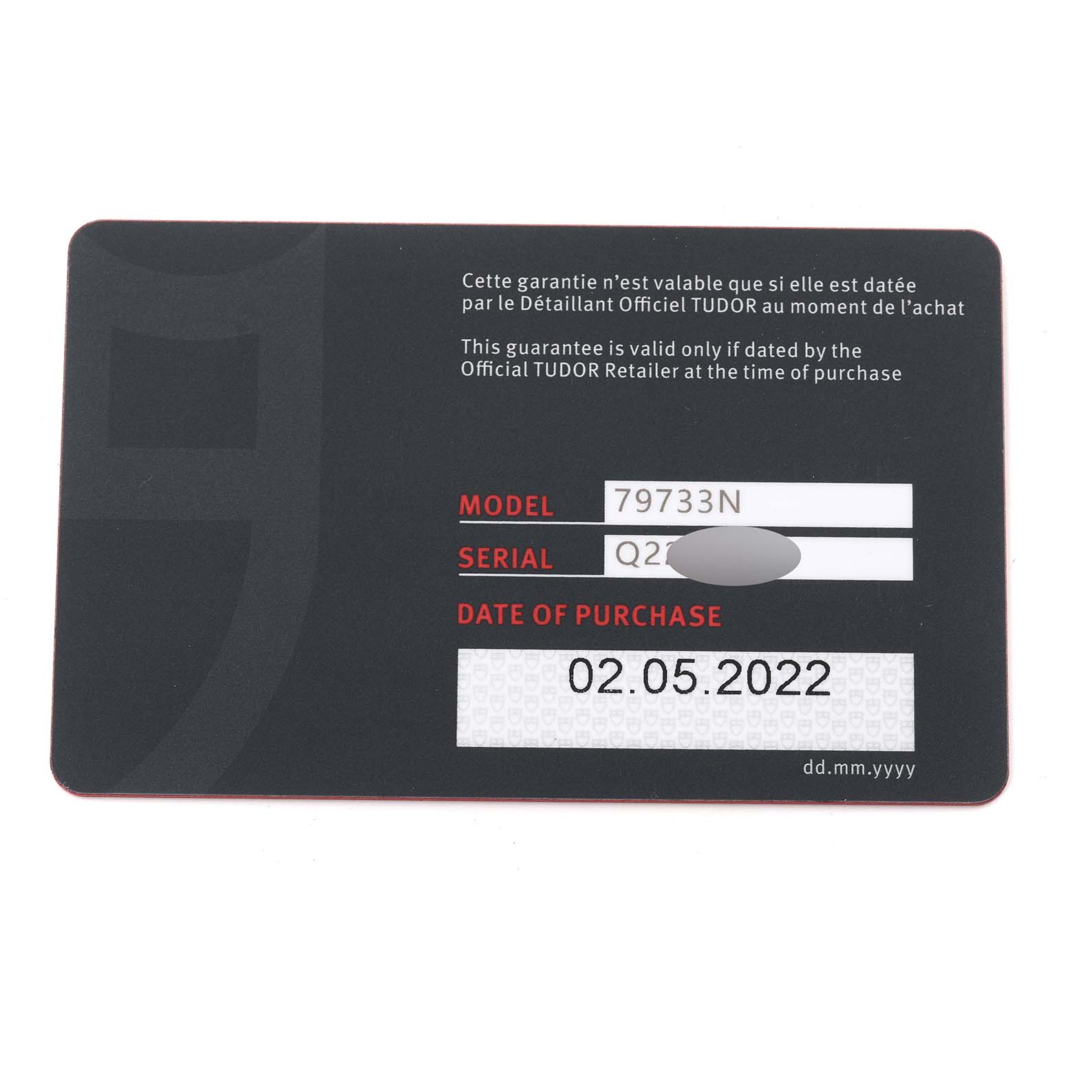 The image shows the warranty card for the Tudor Heritage Black Bay 79733 Men's Steel and Gold (two tone) Champagne Dial 79733 Men's Steel and Gold (two tone) Champagne Dial model 79733N, including model, serial number, and purchase date.