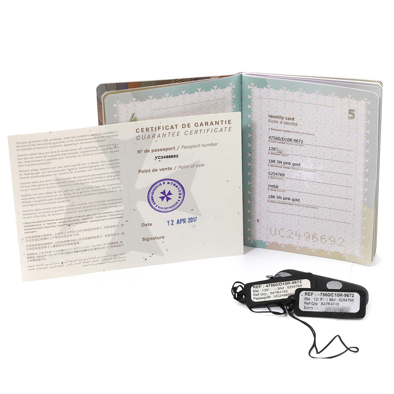 The image shows the warranty certificate, identity card, and tags for the Vacheron Constantin Overseas 47560/D01R-9672 Women's Rose Gold Silver Dial 47560/D01R-9672 Women's Rose Gold Silver Dial model watch.