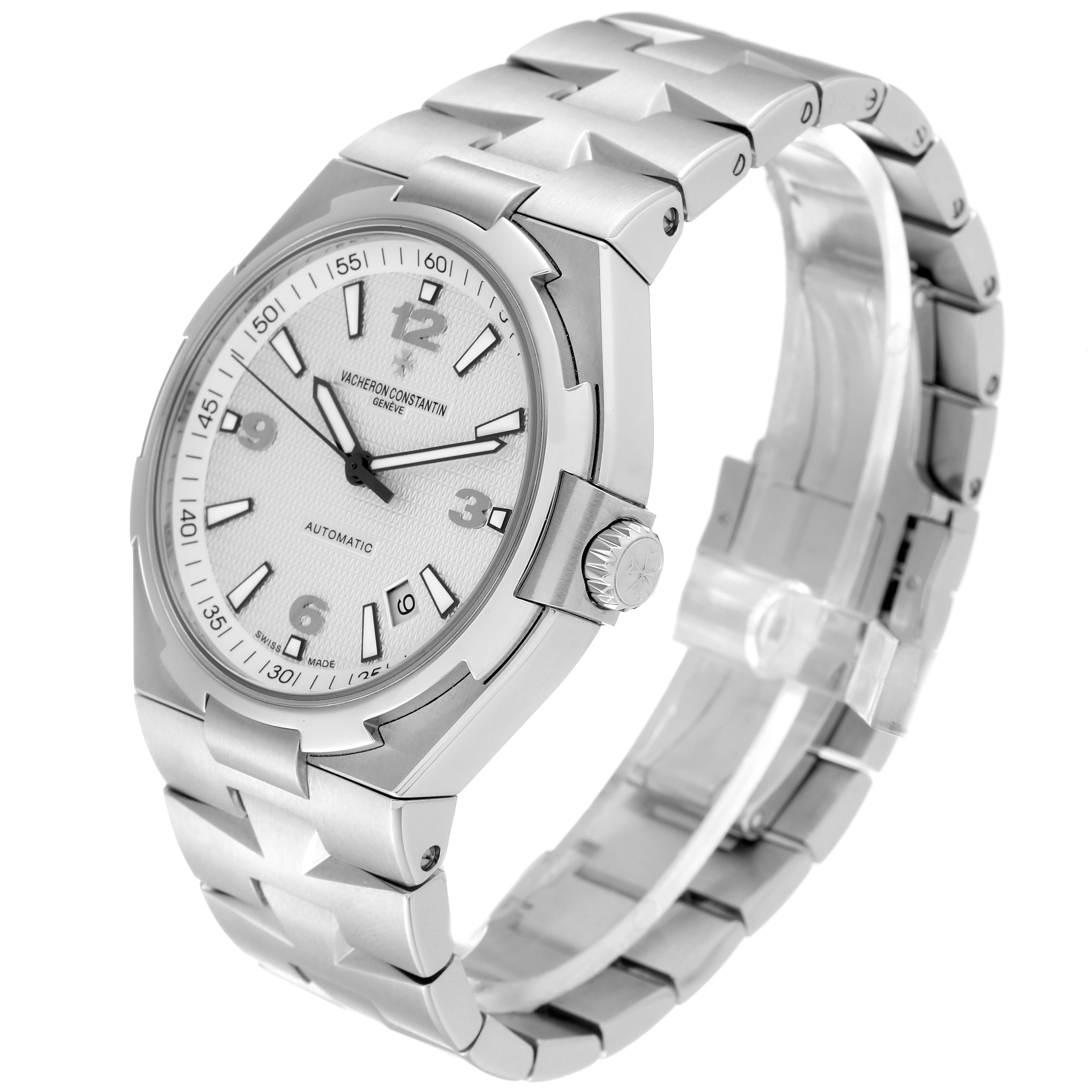 The Vacheron Constantin Overseas 47040B01A-9093 Men
s Stainless Steel Silver Dial 47040B01A-9093 Men
s Stainless Steel Silver Dial watch is depicted at a three-quarter angle, showcasing its face, crown, and bracelet.