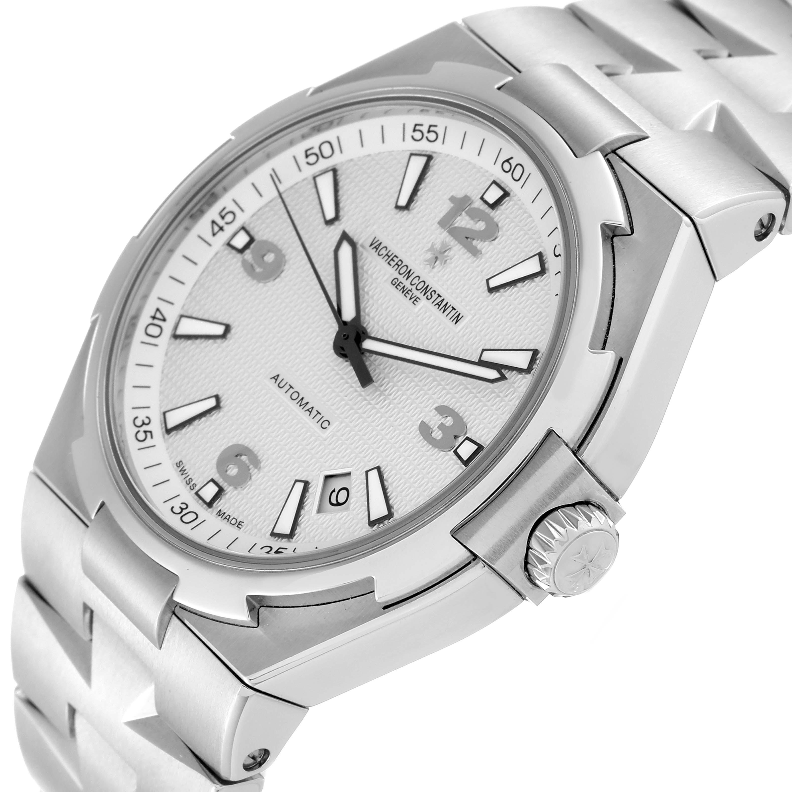 The image shows a Vacheron Constantin Overseas 47040B01A-9093 Men
s Stainless Steel Silver Dial 47040B01A-9093 Men
s Stainless Steel Silver Dial watch at an angled side view, highlighting the dial, crown, and part of the bracelet.