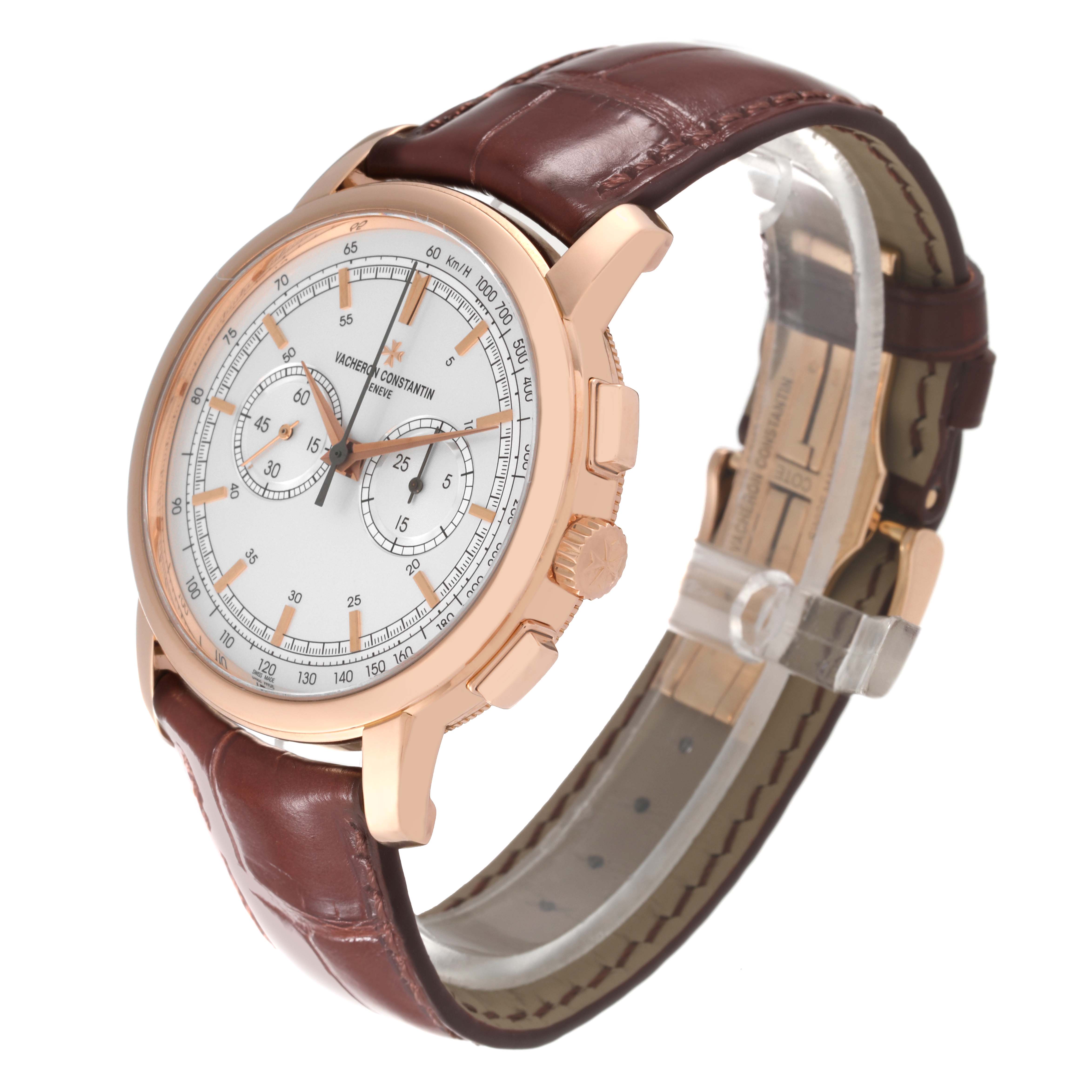 The image shows a Traditionnelle model by Vacheron Constantin at a three-quarter angle, highlighting the watch face and brown leather strap.