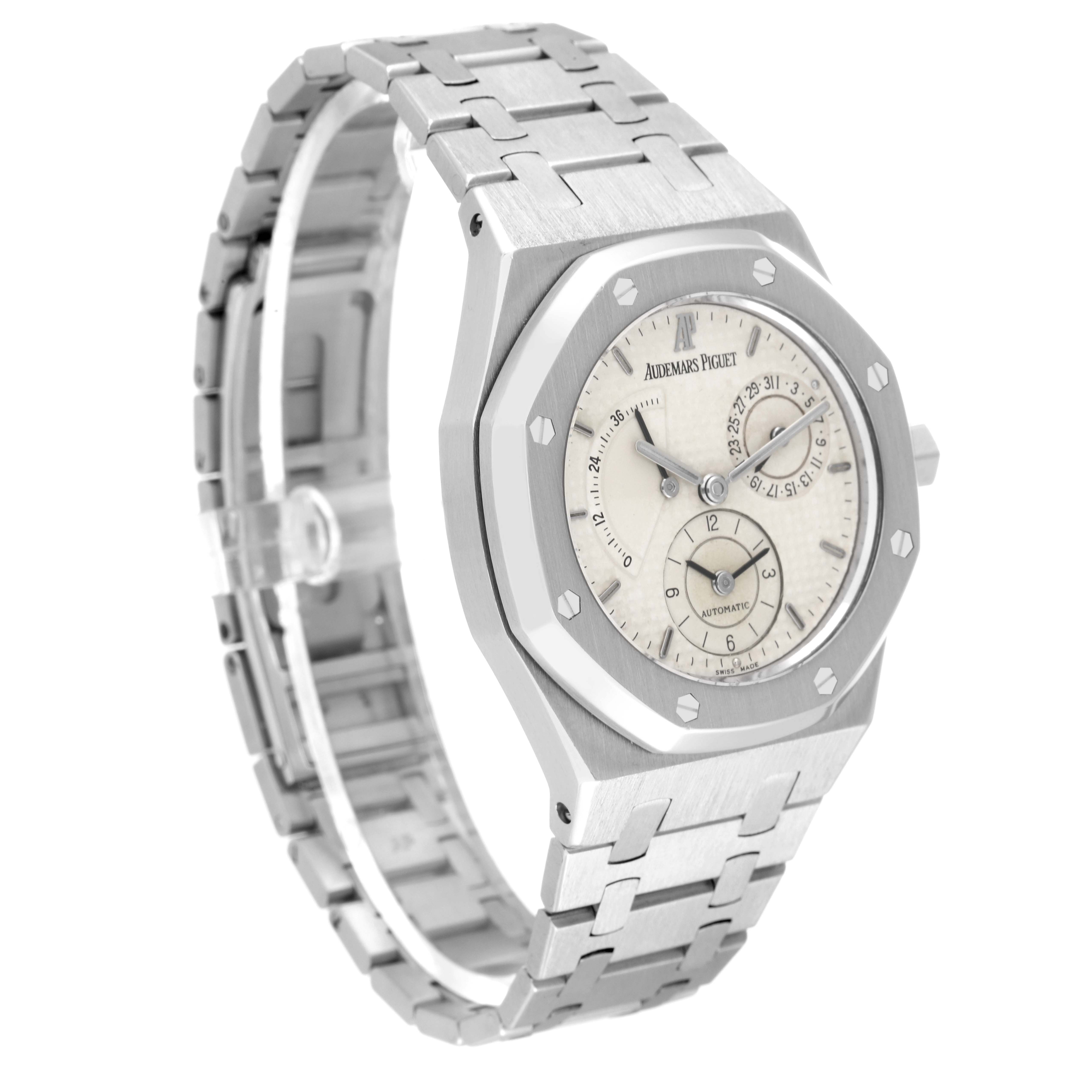 The image shows a side angle of the Audemars Piguet Royal Oak 25730ST Men's Stainless Steel Silver Dial 25730ST Men's Stainless Steel Silver Dial watch, highlighting its face, case, and metal bracelet.