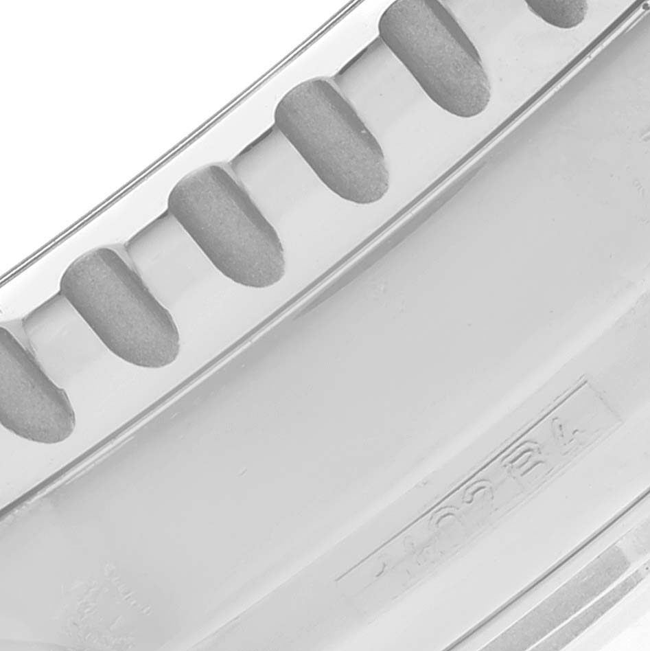 This close-up image shows the bezel edge of a Breitling Navitimer A13322 Men's Stainless Steel Black Dial A13322 Men's Stainless Steel Black Dial watch.