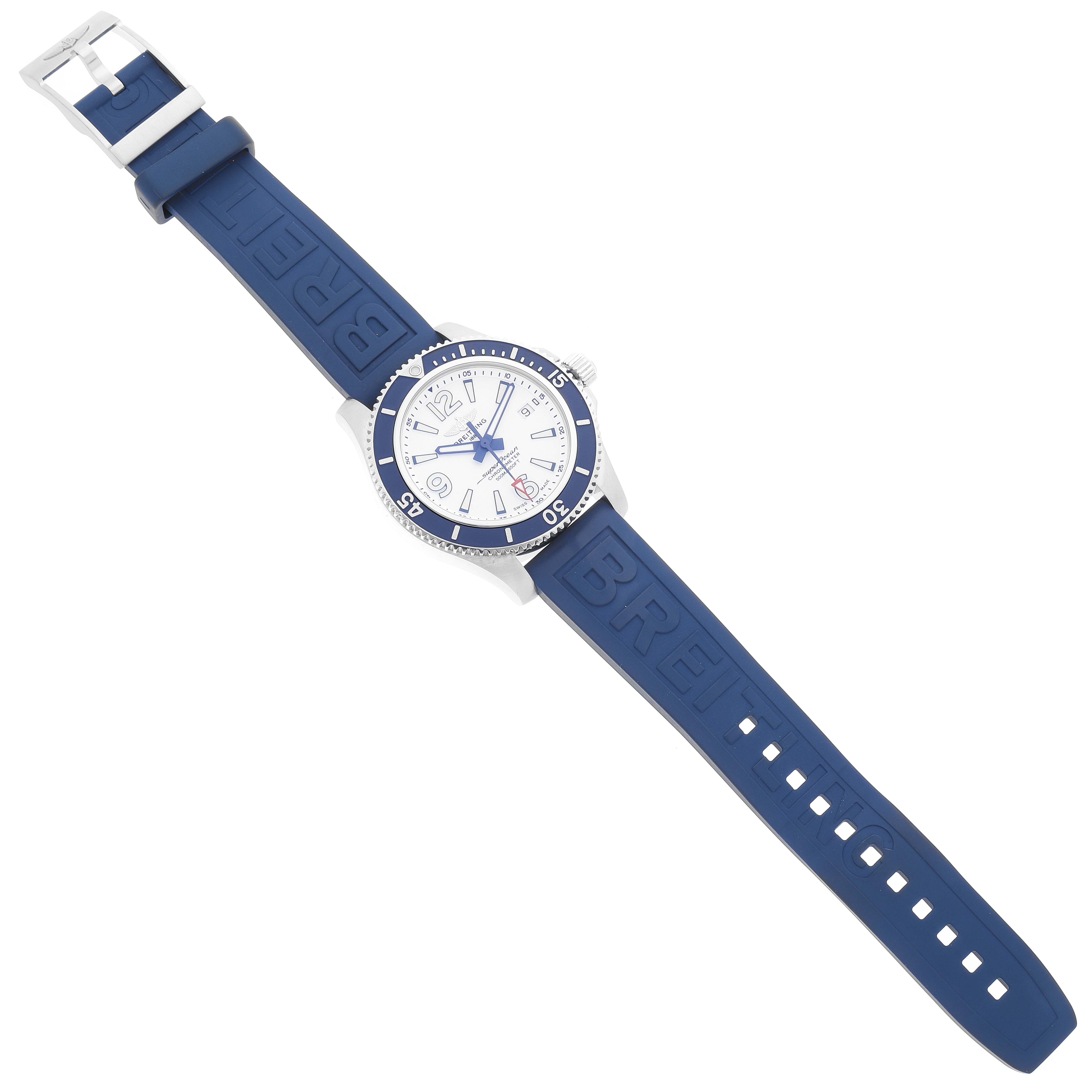 The image shows a full frontal view of a Breitling Superocean A17366 Men
s Stainless Steel White Dial A17366 Men
s Stainless Steel White Dial watch with a blue strap and a white dial.