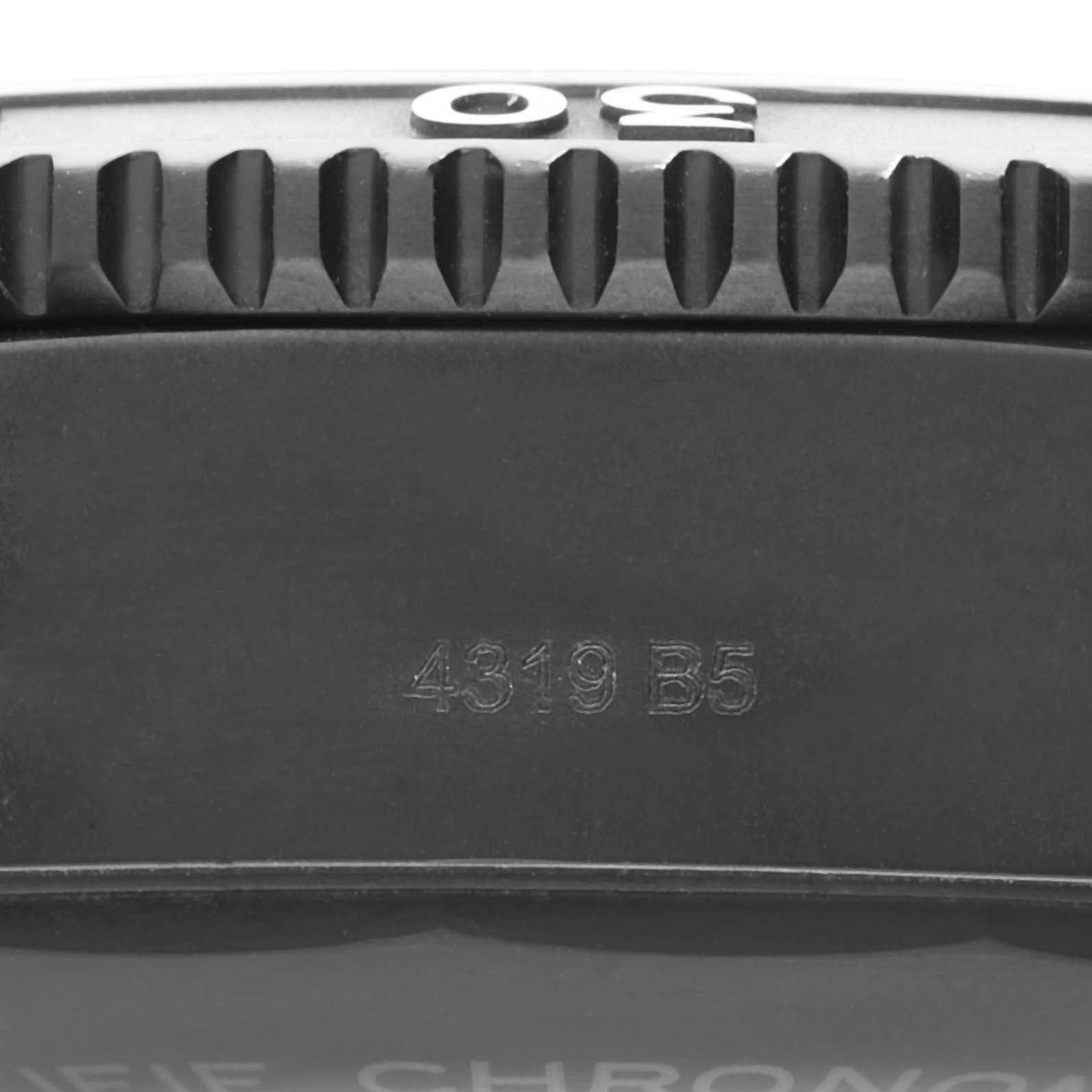 This close-up image shows the side and bezel of the Breitling Superocean M17368 Men's Stainless Steel Black Dial M17368 Men's Stainless Steel Black Dial watch, including the engraved serial number.