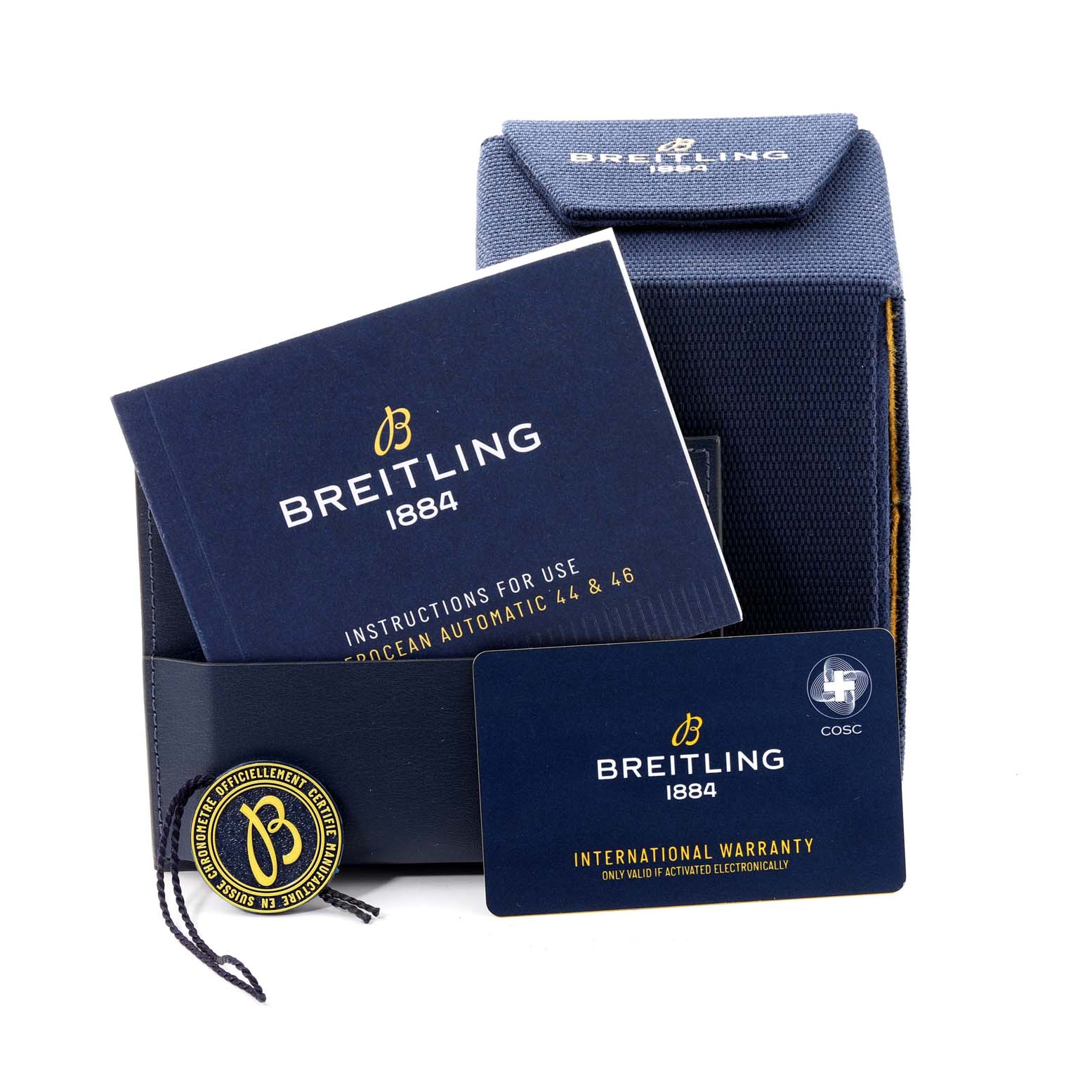 The image shows the Breitling Superocean M17368 Men's Stainless Steel Black Dial M17368 Men's Stainless Steel Black Dial watch packaging, including a warranty card, manual, and a tag, displayed from the front.