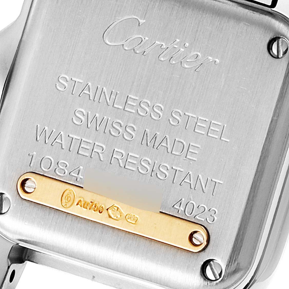 The image shows the engraved back case of a Cartier Panthere W2PN0006 Women's Steel and Gold (two tone) Silver Dial W2PN0006 Women's Steel and Gold (two tone) Silver Dial watch with branding and details.