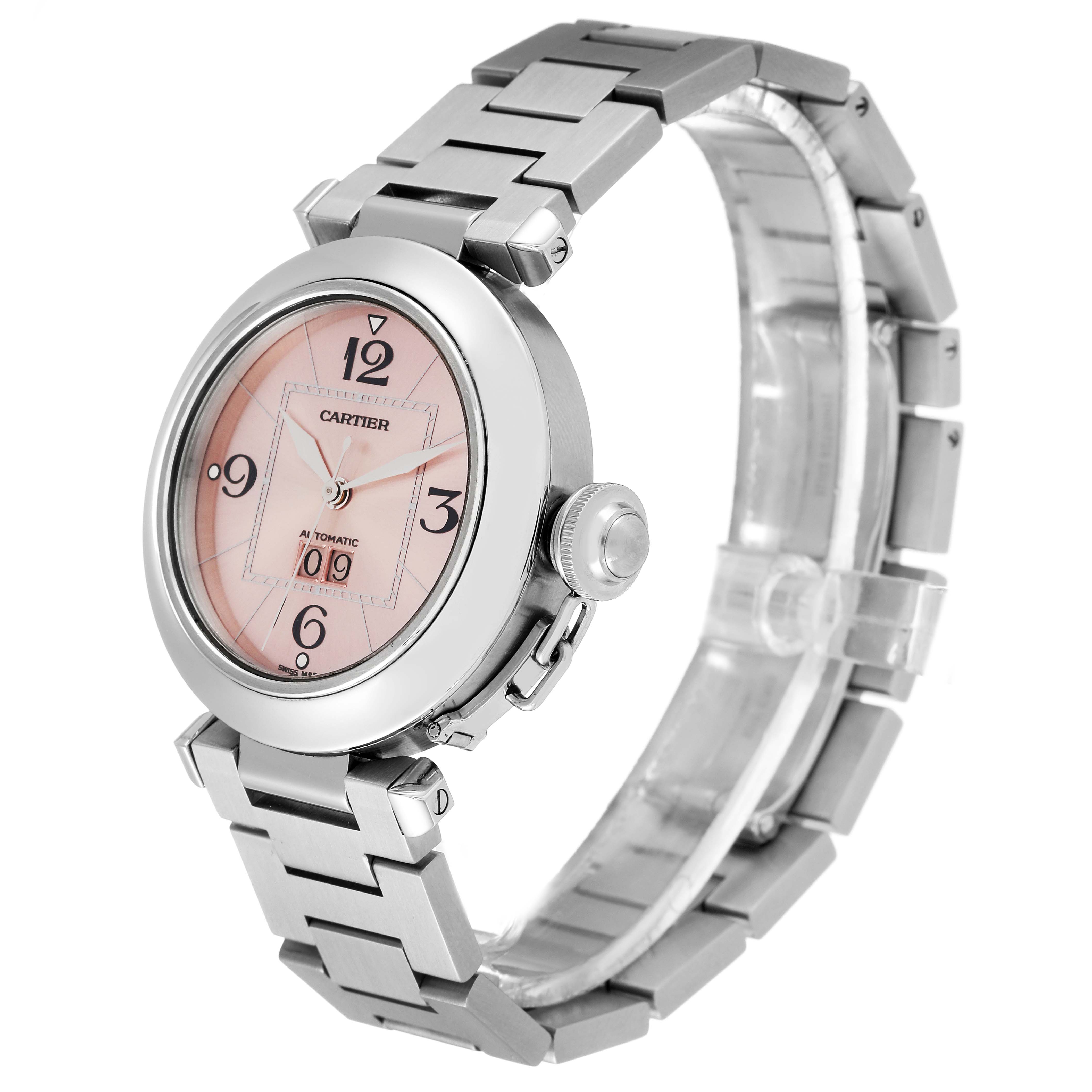 The Cartier Pasha W31058M7 Women's Stainless Steel Pink Dial W31058M7 Women's Stainless Steel Pink Dial watch is shown at a slight angle, displaying its face, bezel, crown, and metal bracelet.