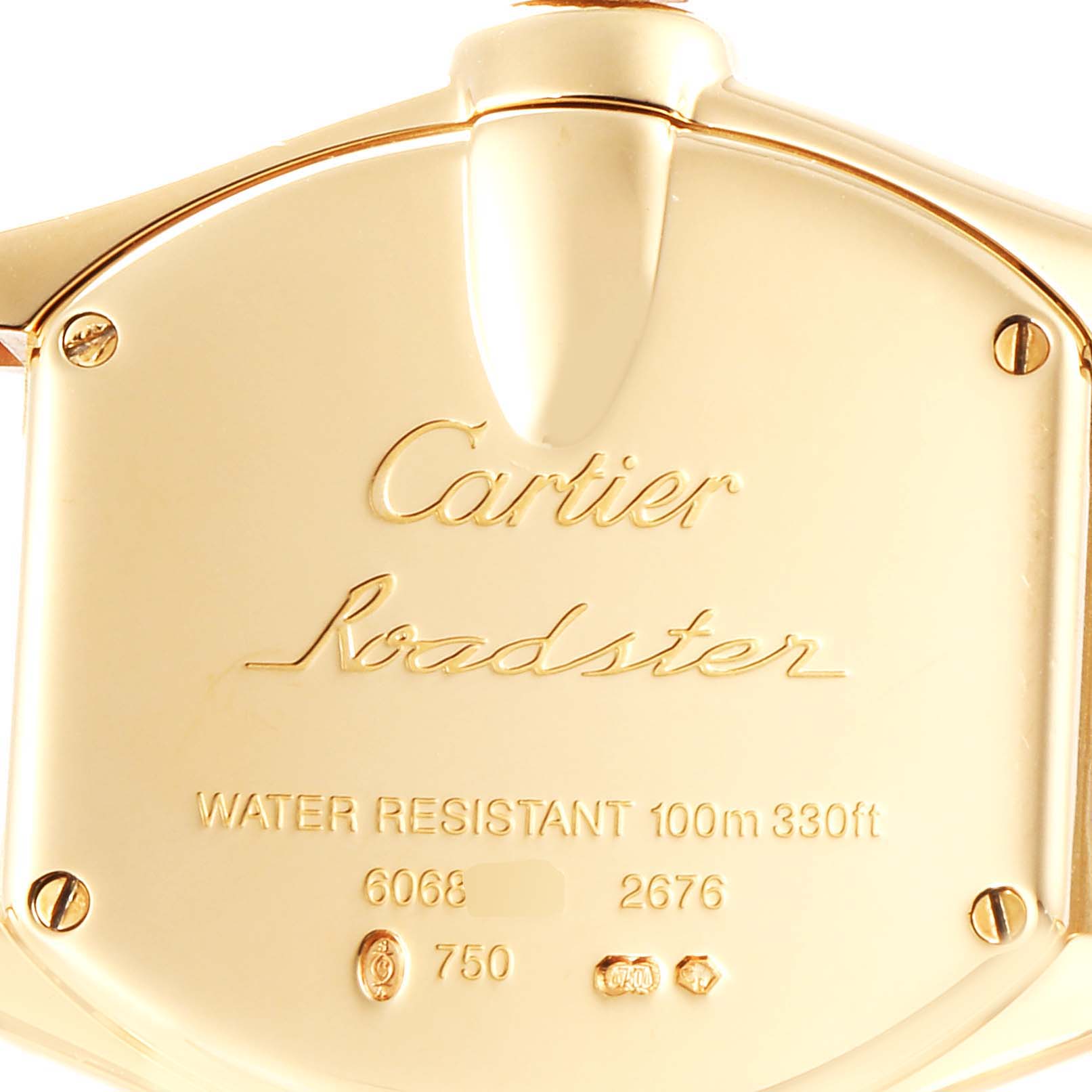 This image shows the engraved backplate of a Cartier Roadster W62018Y5 Women's Yellow Gold Silver Dial W62018Y5 Women's Yellow Gold Silver Dial watch, highlighting its model details and water resistance.