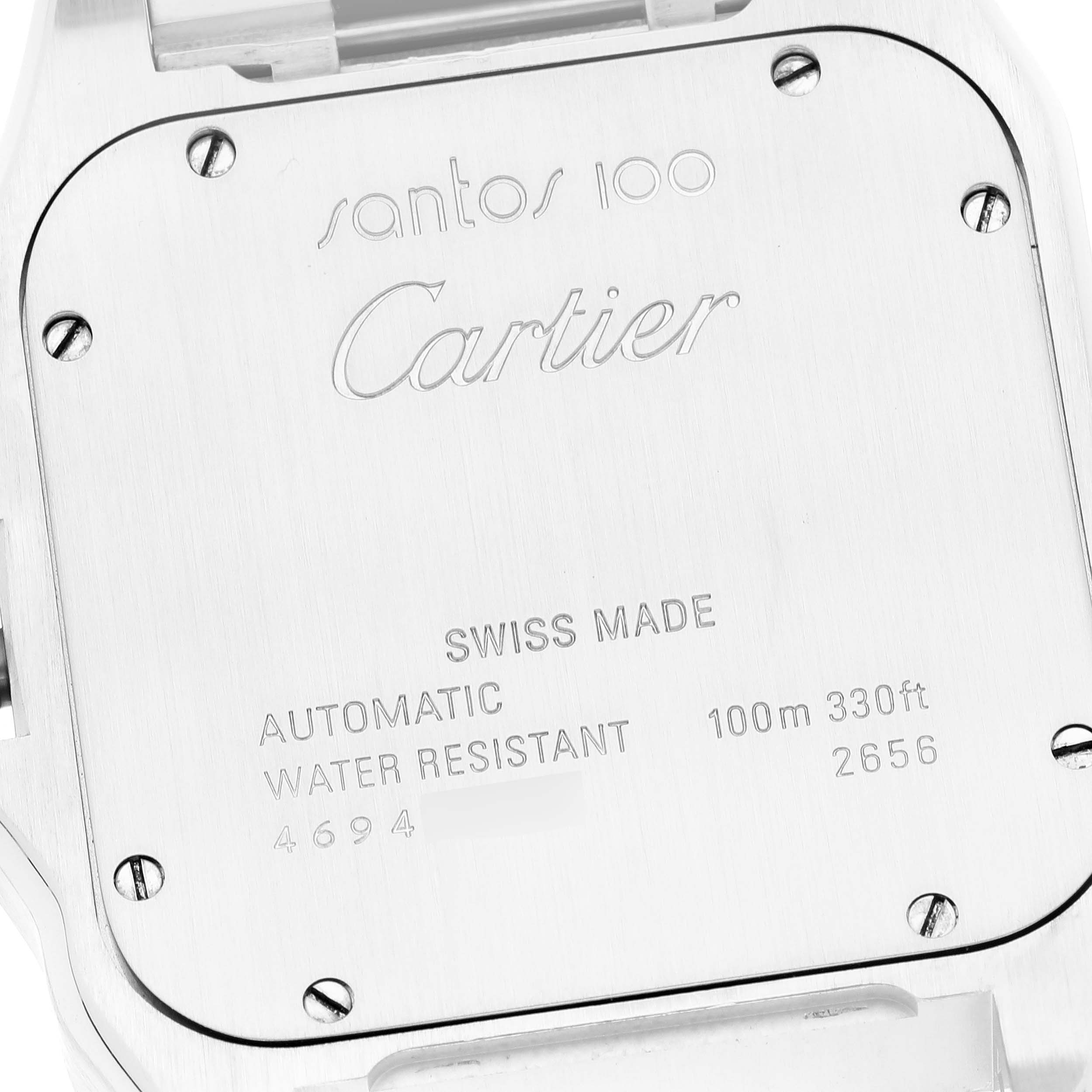This image shows the case back of a Santos 100 model watch by Cartier.