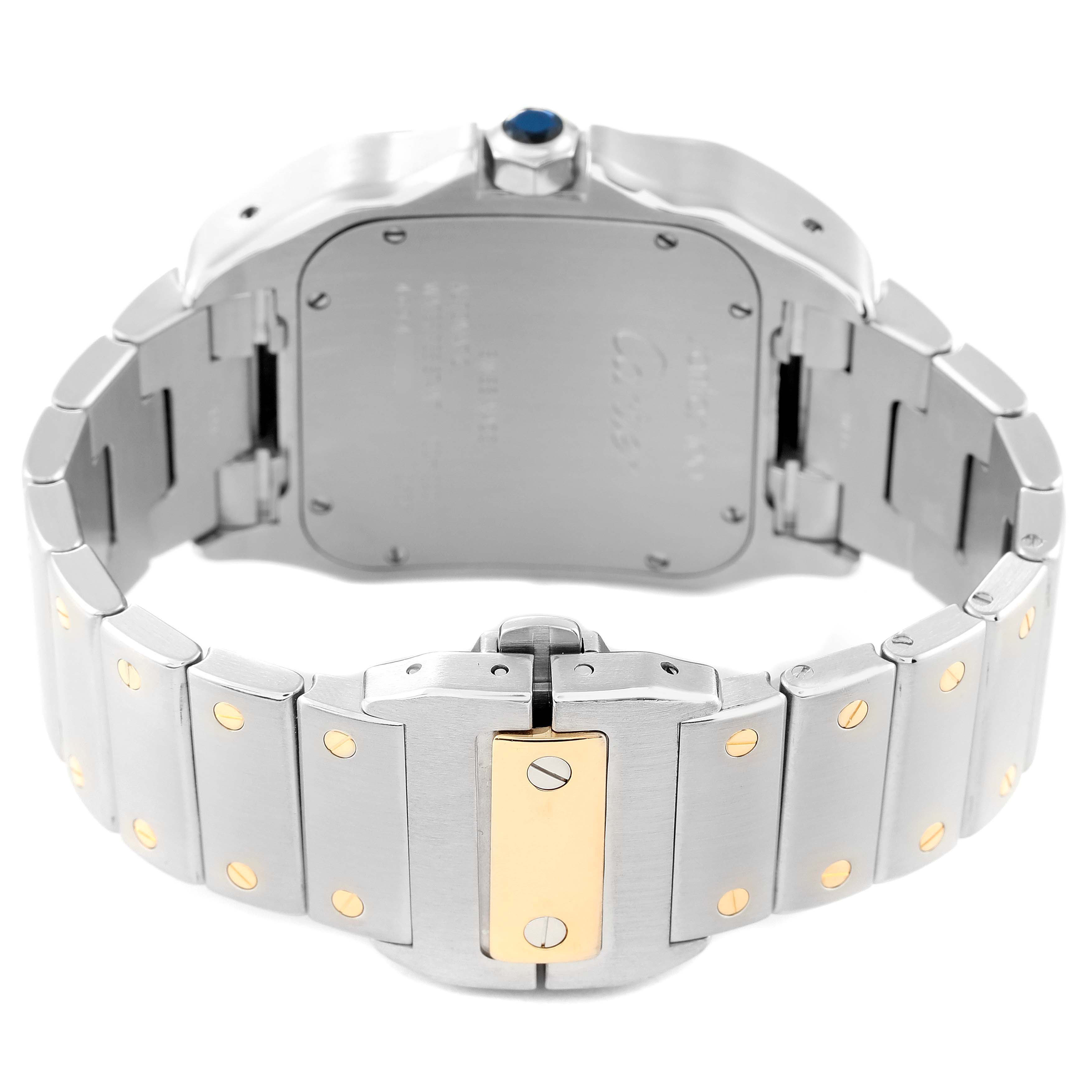 The image shows the back and bracelet of a Cartier Santos W200728G Men's Stainless Steel Silver Dial W200728G Men's Stainless Steel Silver Dial watch, featuring the clasp and the signature blue sapphire crown.