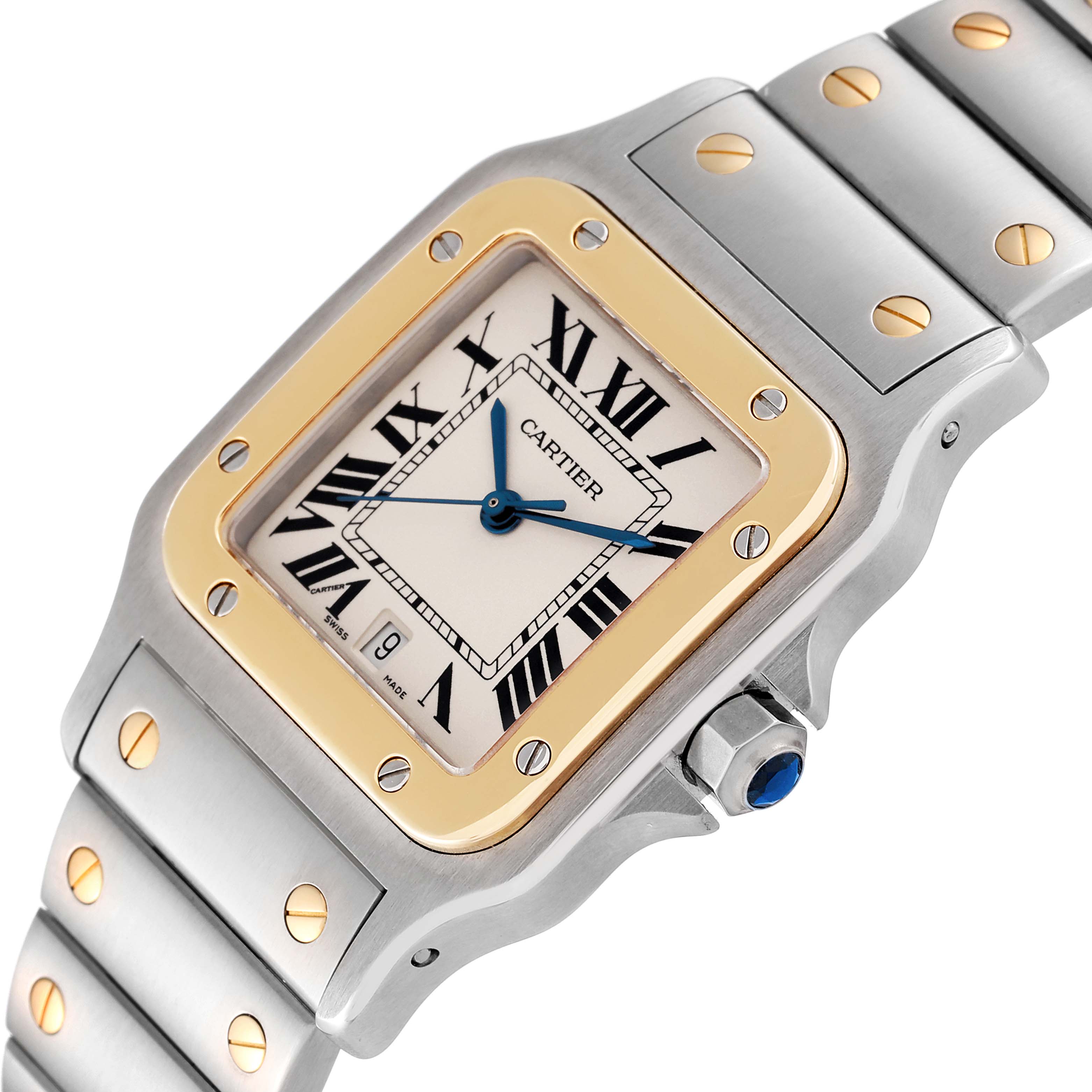 This image shows a close-up of the Cartier Santos W20011C4 Men
s Steel and Gold (two tone) Silver Dial W20011C4 Men
s Steel and Gold (two tone) Silver Dial watch face and part of the band, highlighting the screws, blue hands, and date window.