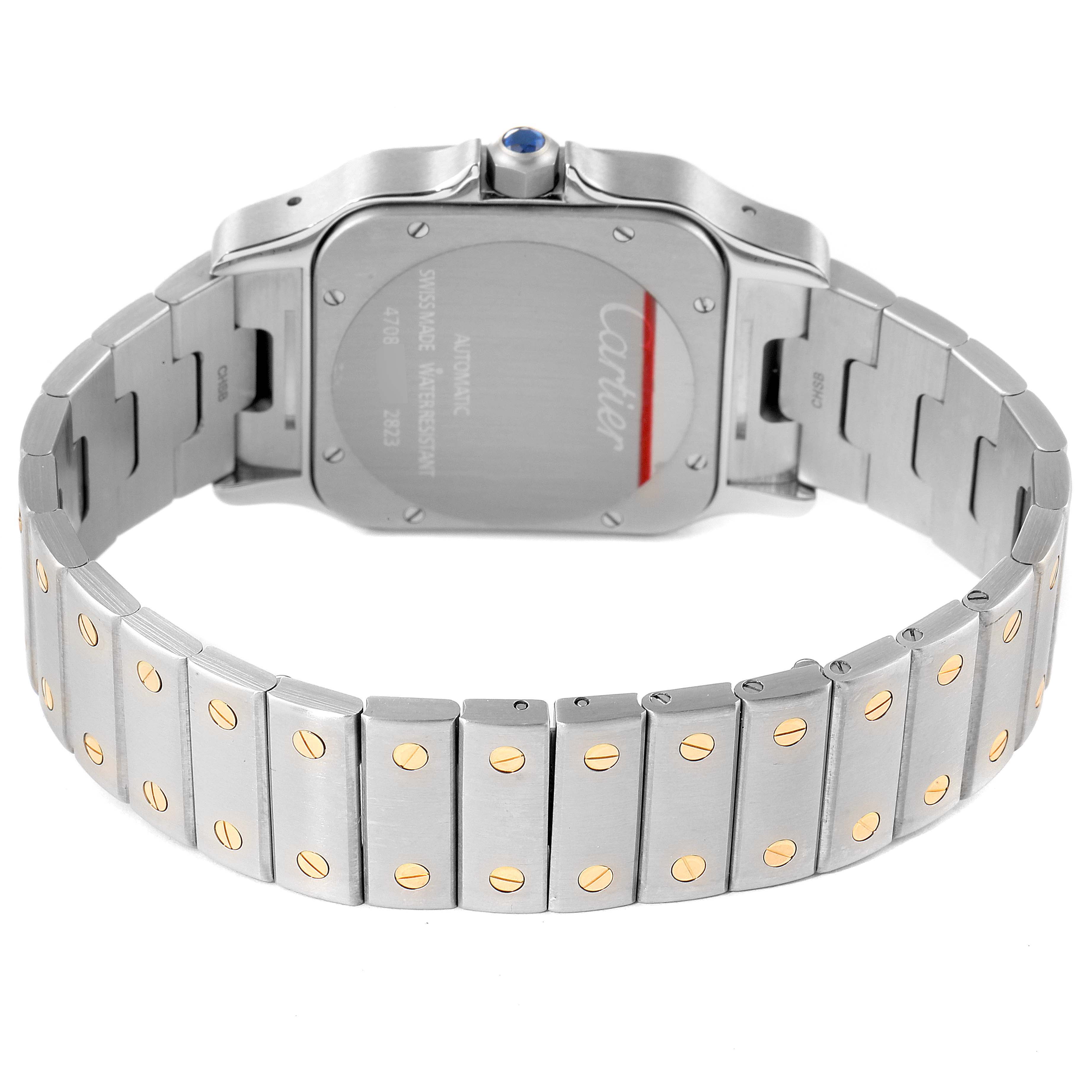 The image shows the back view of a Cartier Santos W20099C4 Men
s Steel and Gold (two tone) Silver Dial W20099C4 Men
s Steel and Gold (two tone) Silver Dial watch, highlighting the case, bracelet, and deployment clasp.