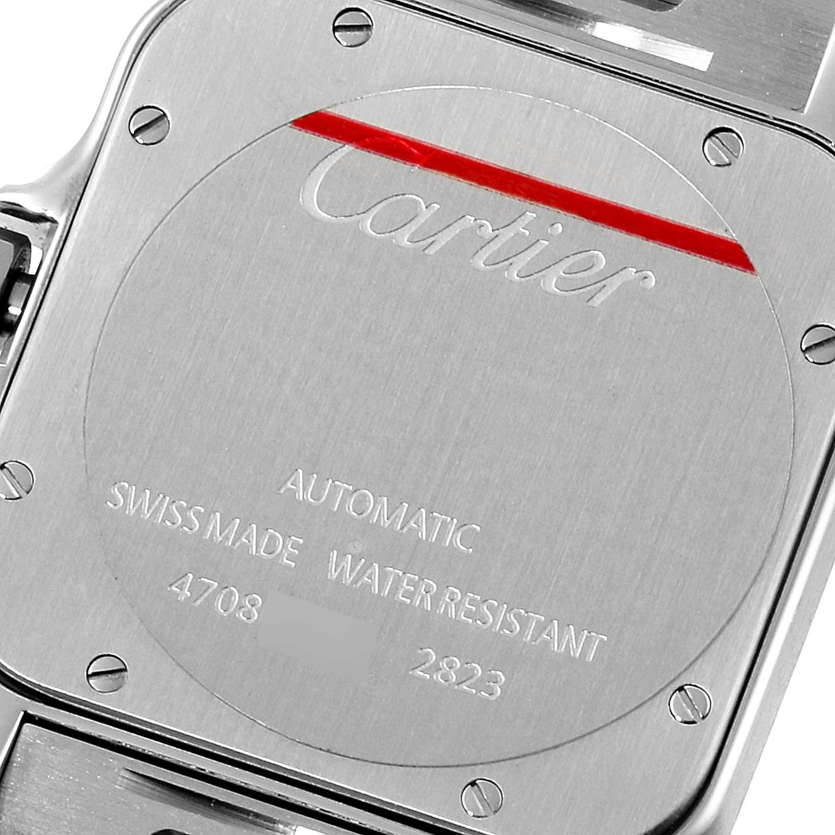 The image shows the back case of a Santos model watch by Cartier, detailing its automatic movement and water-resistance.