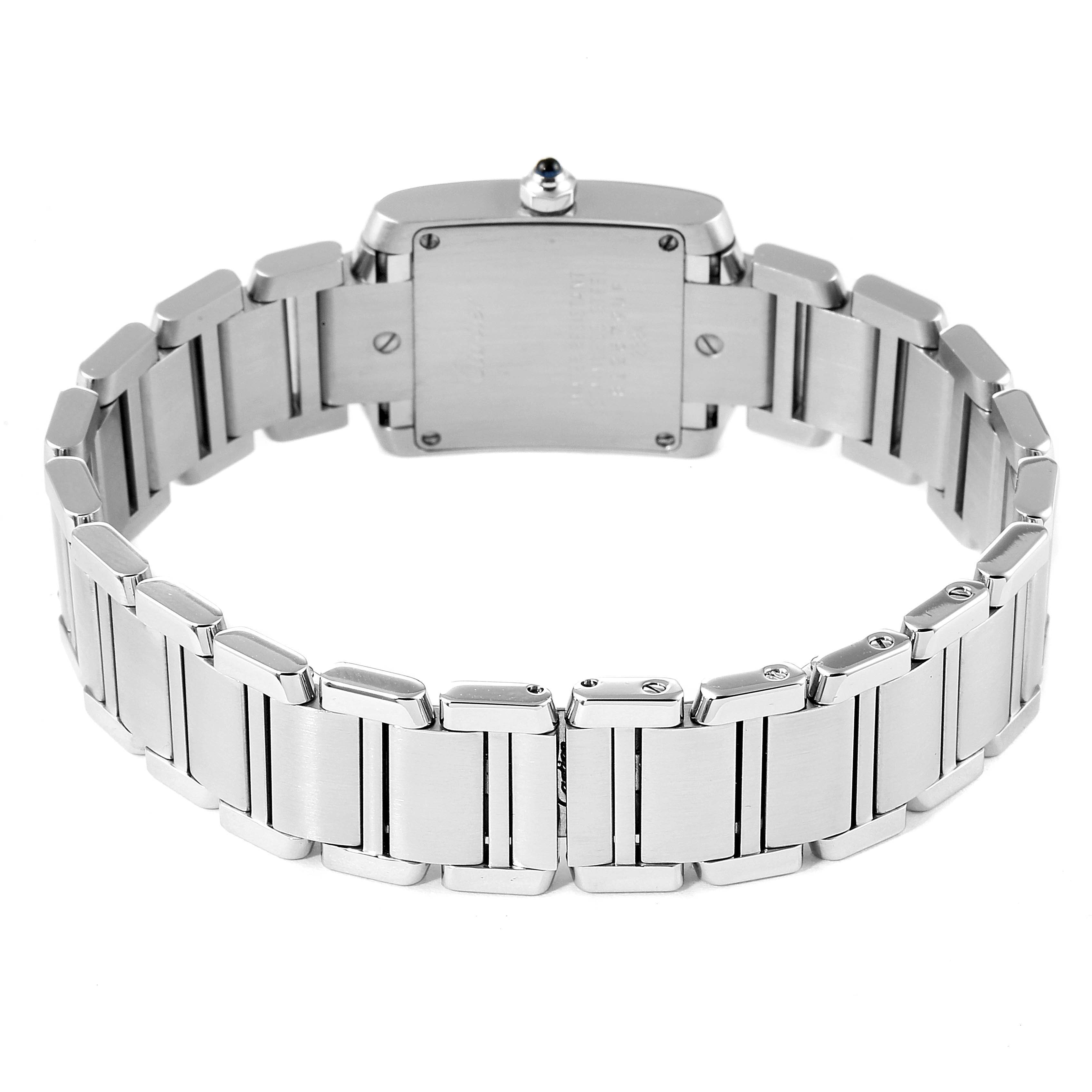 The image shows the back view of a Cartier Tank Francaise W51008Q3 Women's Stainless Steel Silver Dial W51008Q3 Women's Stainless Steel Silver Dial watch, highlighting its metal bracelet and case back.