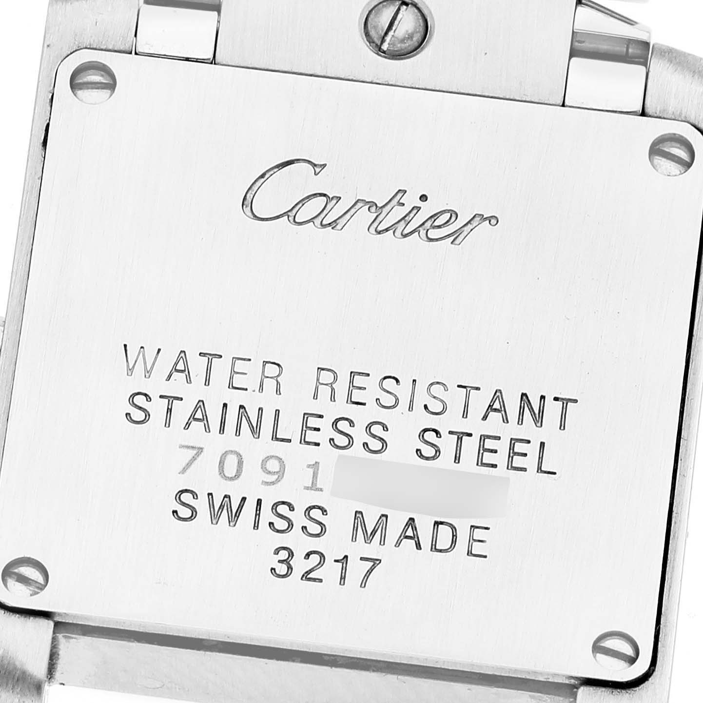 The image shows the back of the Cartier Tank Francaise W51008Q3 Women
s Stainless Steel Silver Dial W51008Q3 Women
s Stainless Steel Silver Dial watch, highlighting its stainless steel case and engravings.