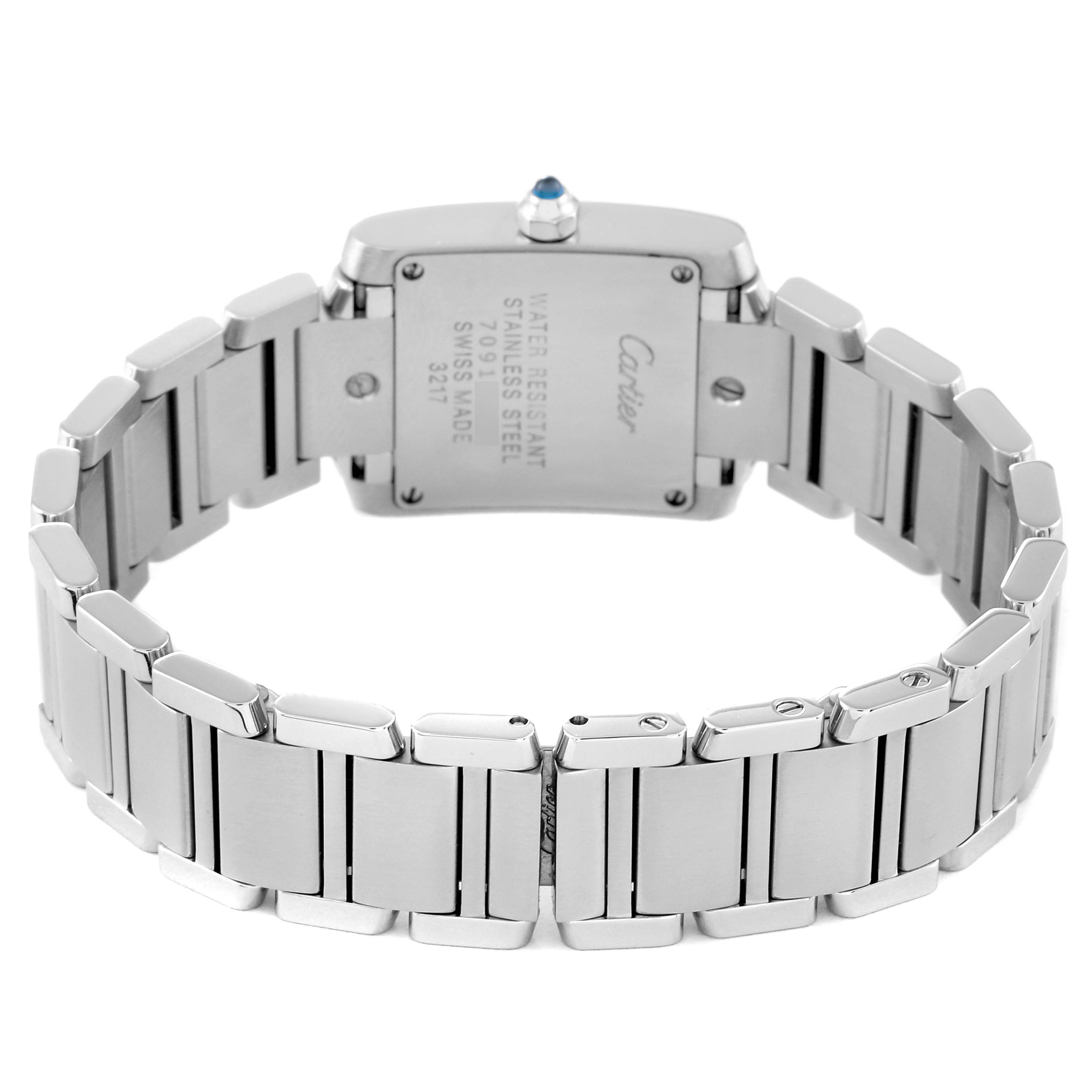 The image shows the back and stainless steel bracelet of a Cartier Tank Française watch, highlighting its engravings and clasp.