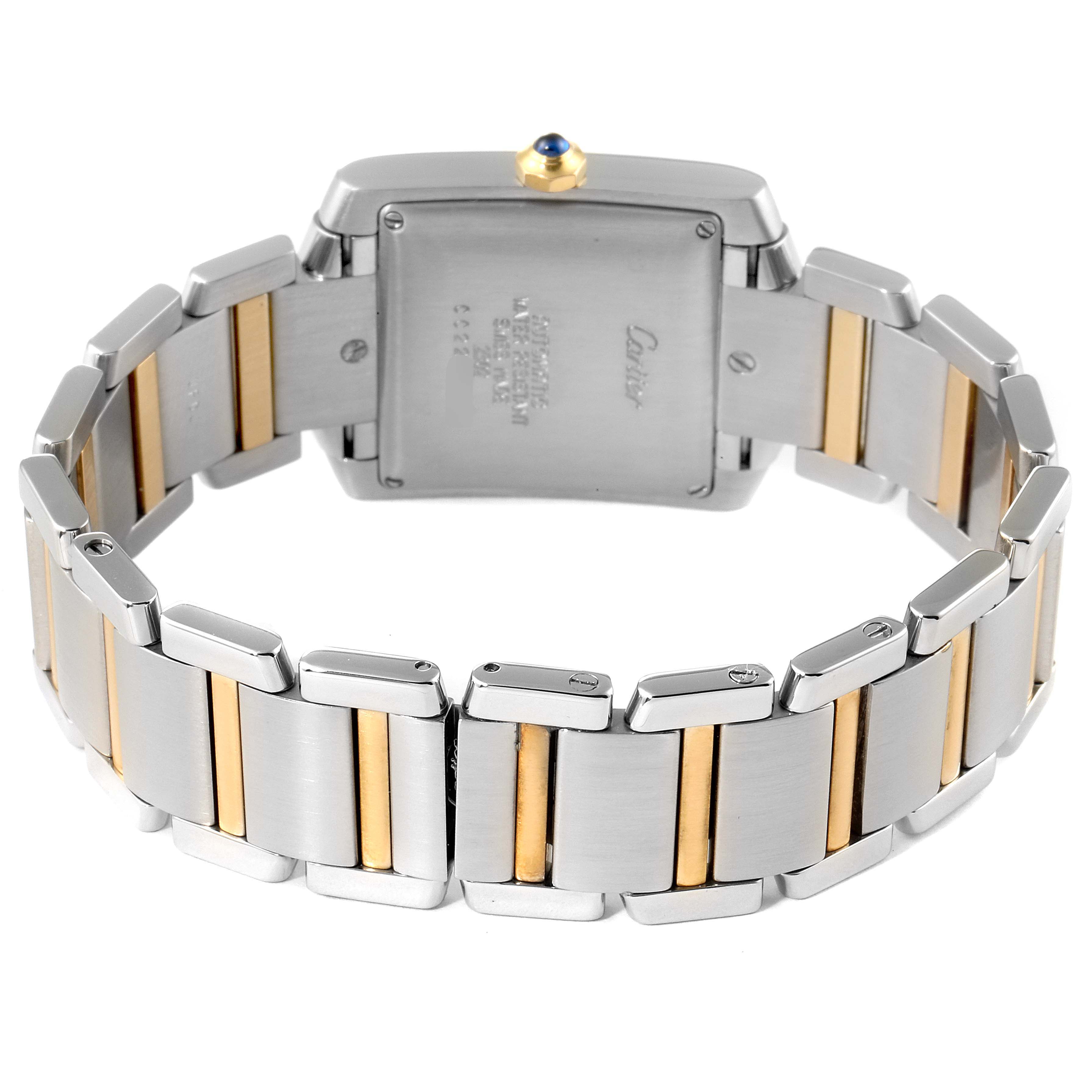 This image shows the back view of the Cartier Tank Française watch, specifically its stainless steel and gold bracelet.