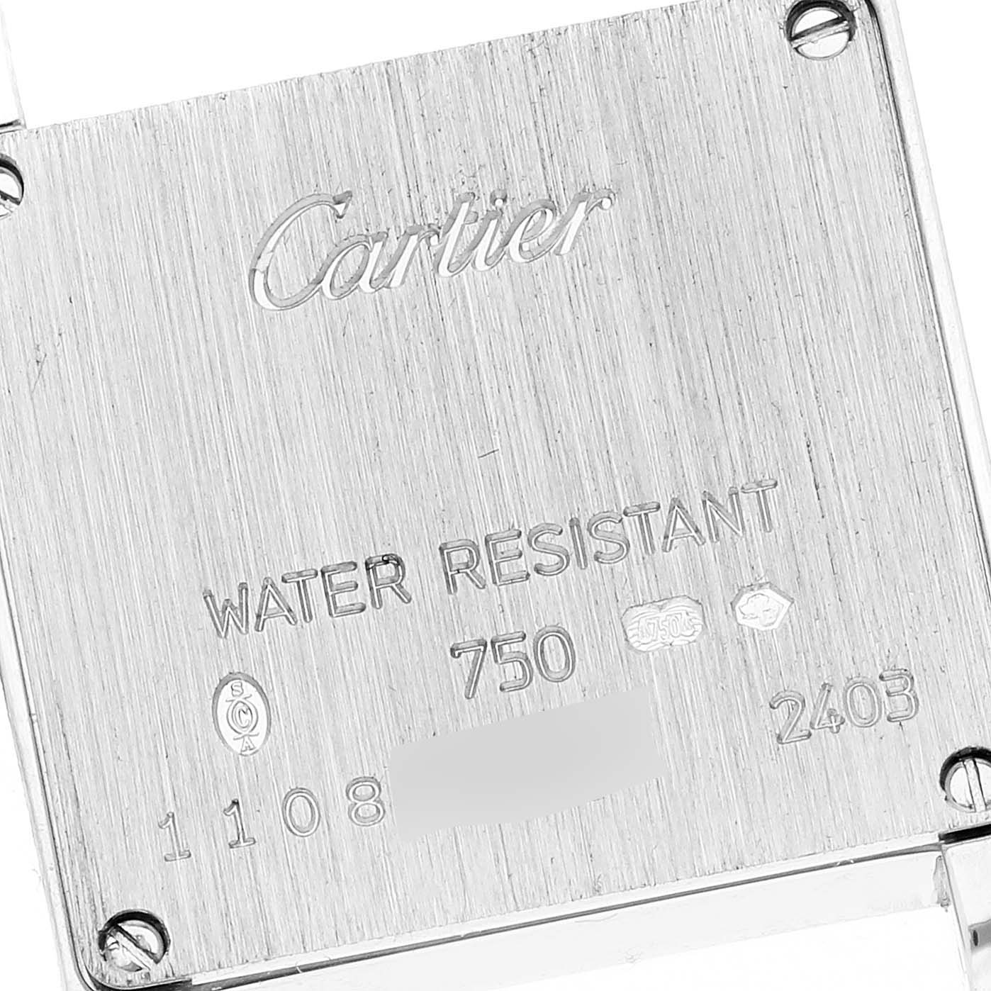 This image shows the case back of a Cartier Tank Francaise WE100251 Women
s White Gold Silver Dial WE100251 Women
s White Gold Silver Dial watch, featuring the brand
s engraving and water resistance details.