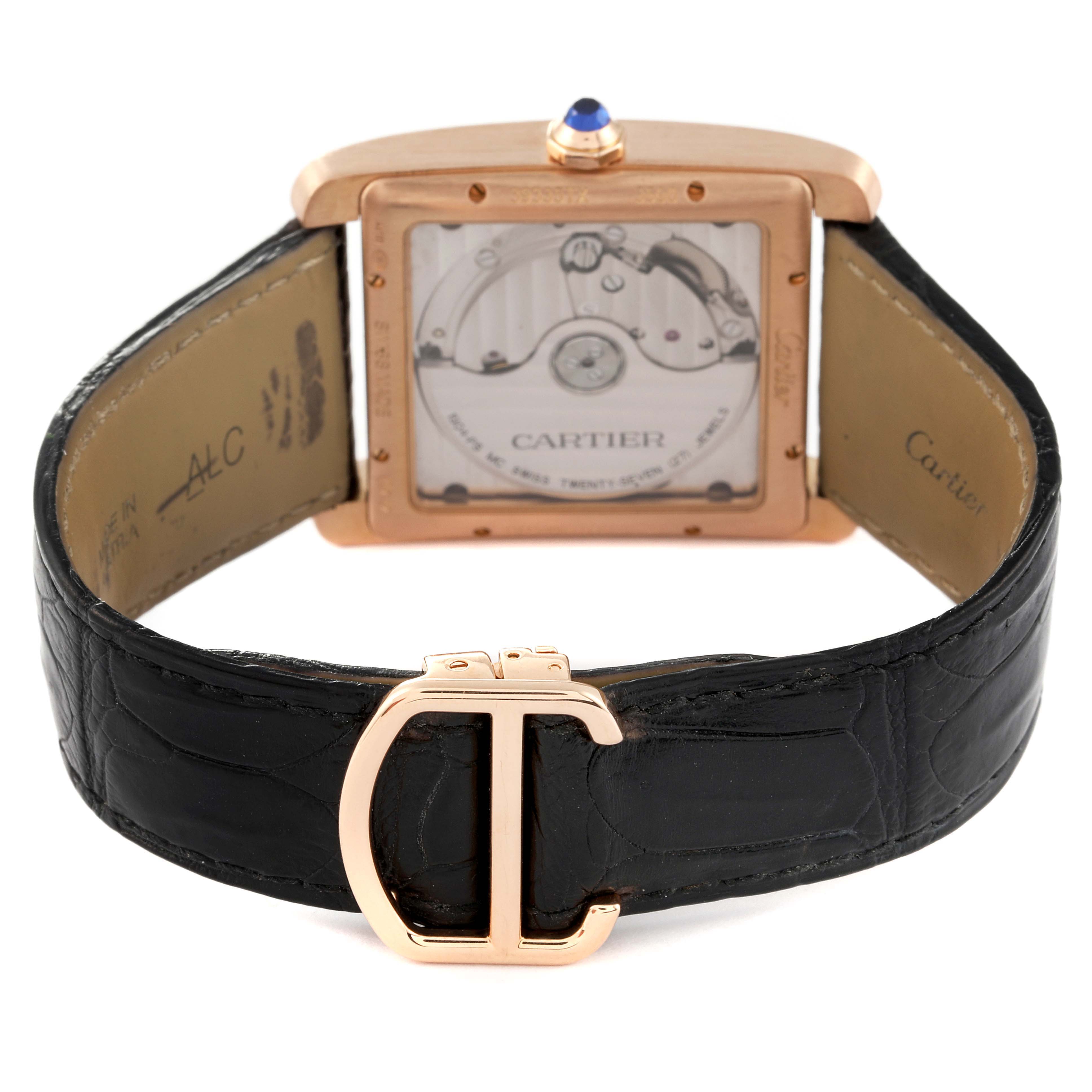 The image shows the back of the Cartier Tank MC W5330002 Men's Rose Gold Brown Dial W5330002 Men's Rose Gold Brown Dial watch, highlighting its open case back, black leather strap, and rose gold clasp.