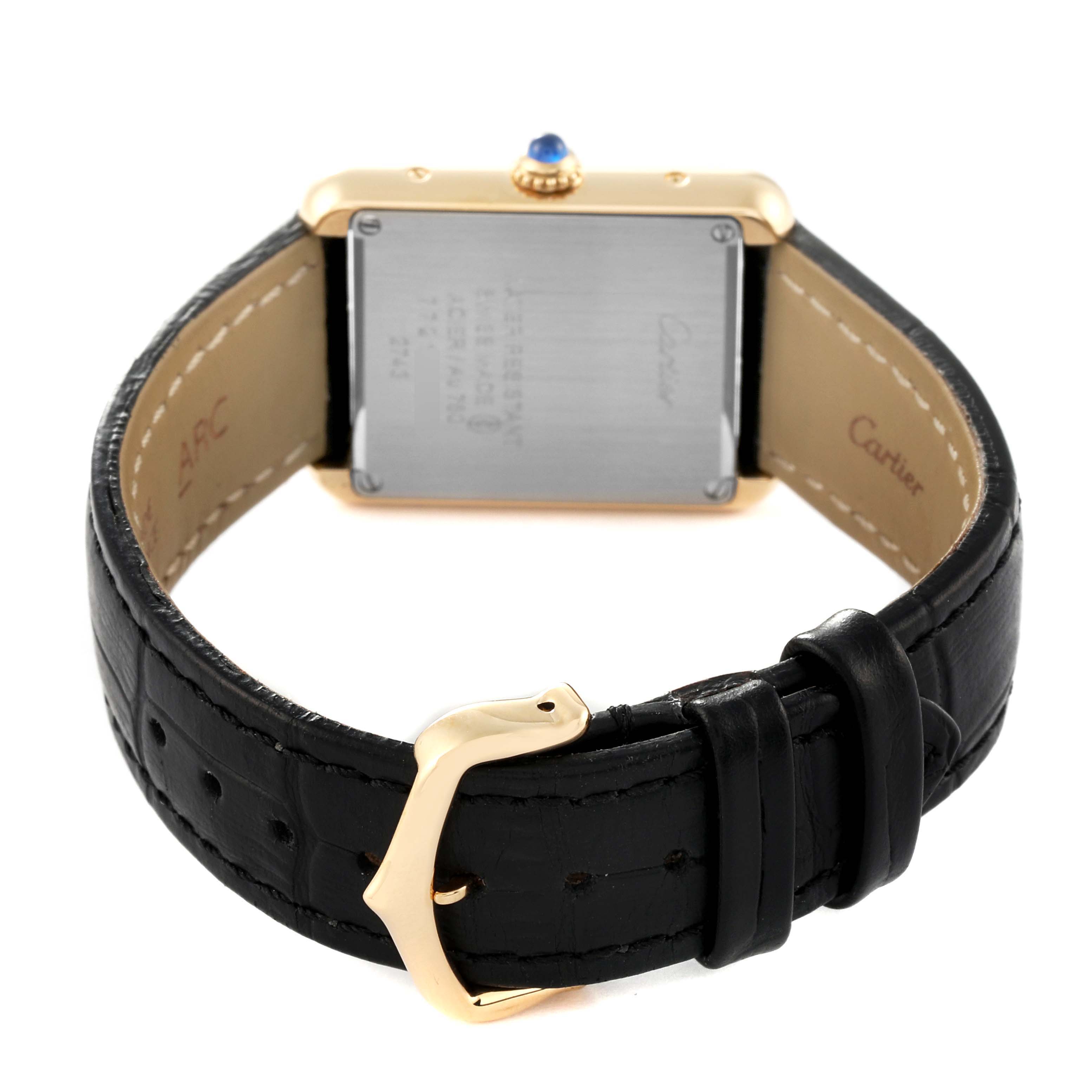 The image shows the back of a Cartier Tank Solo W1018755 Women's Yellow Gold Silver Dial W1018755 Women's Yellow Gold Silver Dial watch, highlighting the case back, leather strap, and buckle.