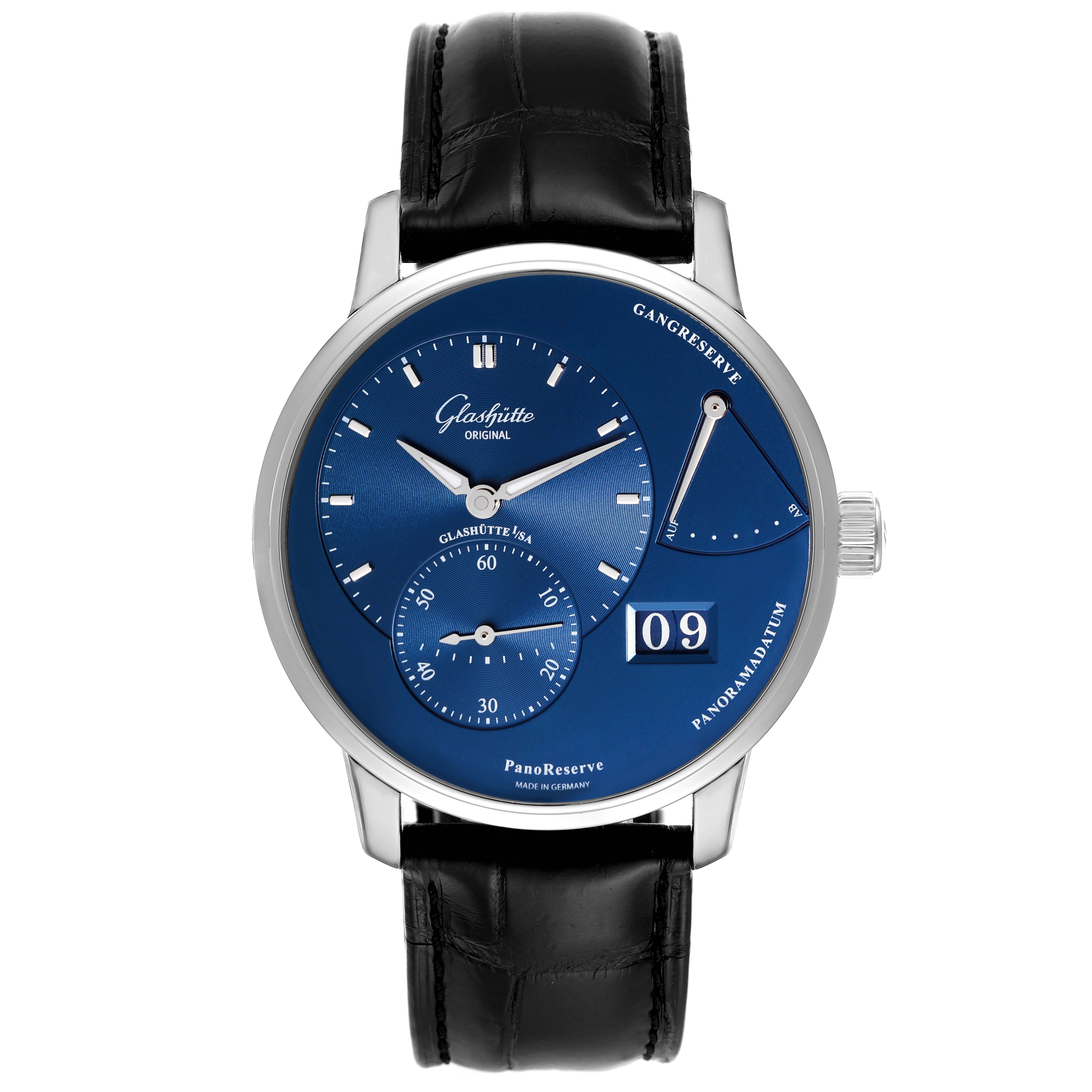 The image shows a Glashütte Original PanoReserve watch from a front angle, highlighting its blue dial, black leather strap, and visible complications.