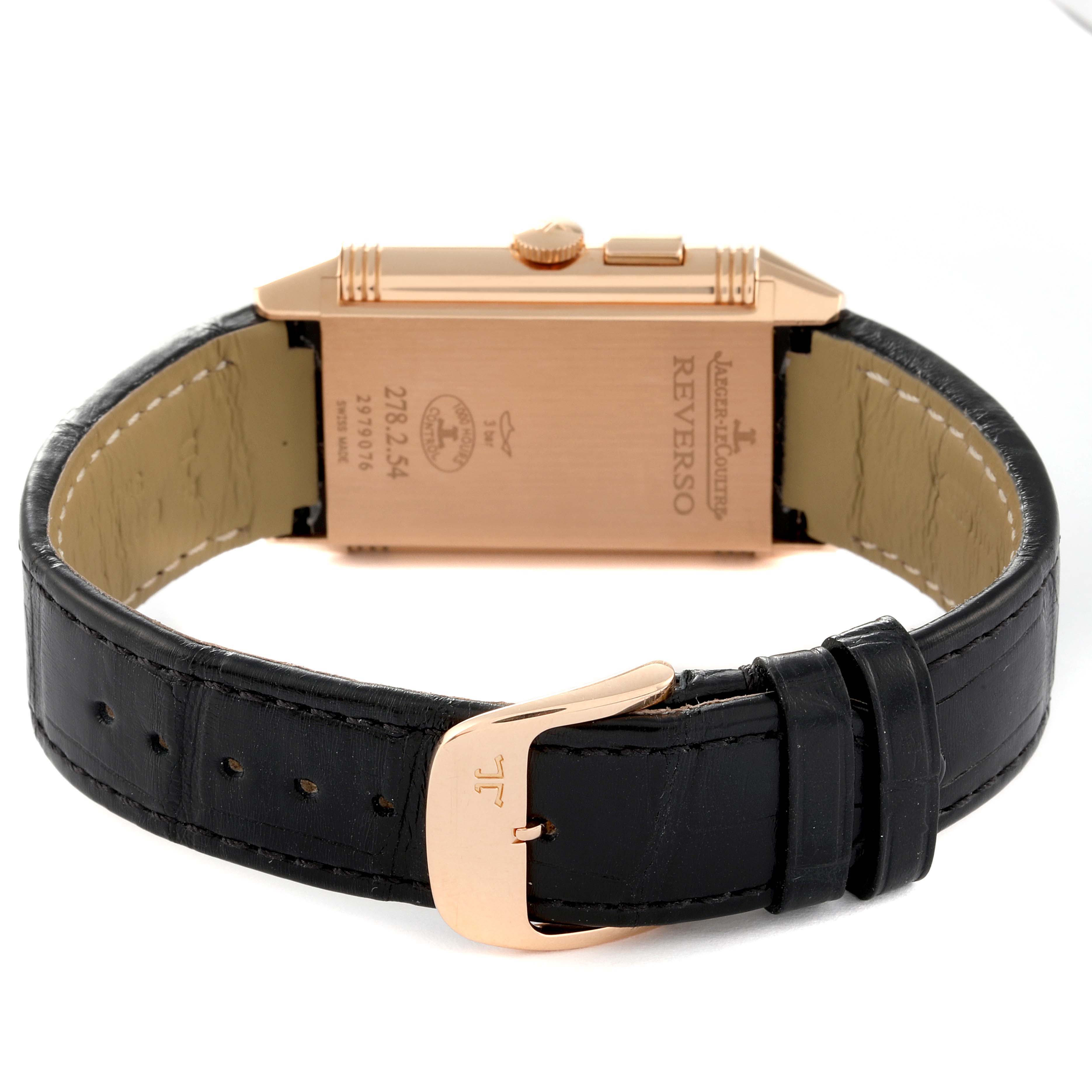 This image shows the back case and strap of a Jaeger LeCoultre Reverso Q3782520 Men's Rose Gold Silver Dial Q3782520 Men's Rose Gold Silver Dial watch, including the buckle and model inscriptions.