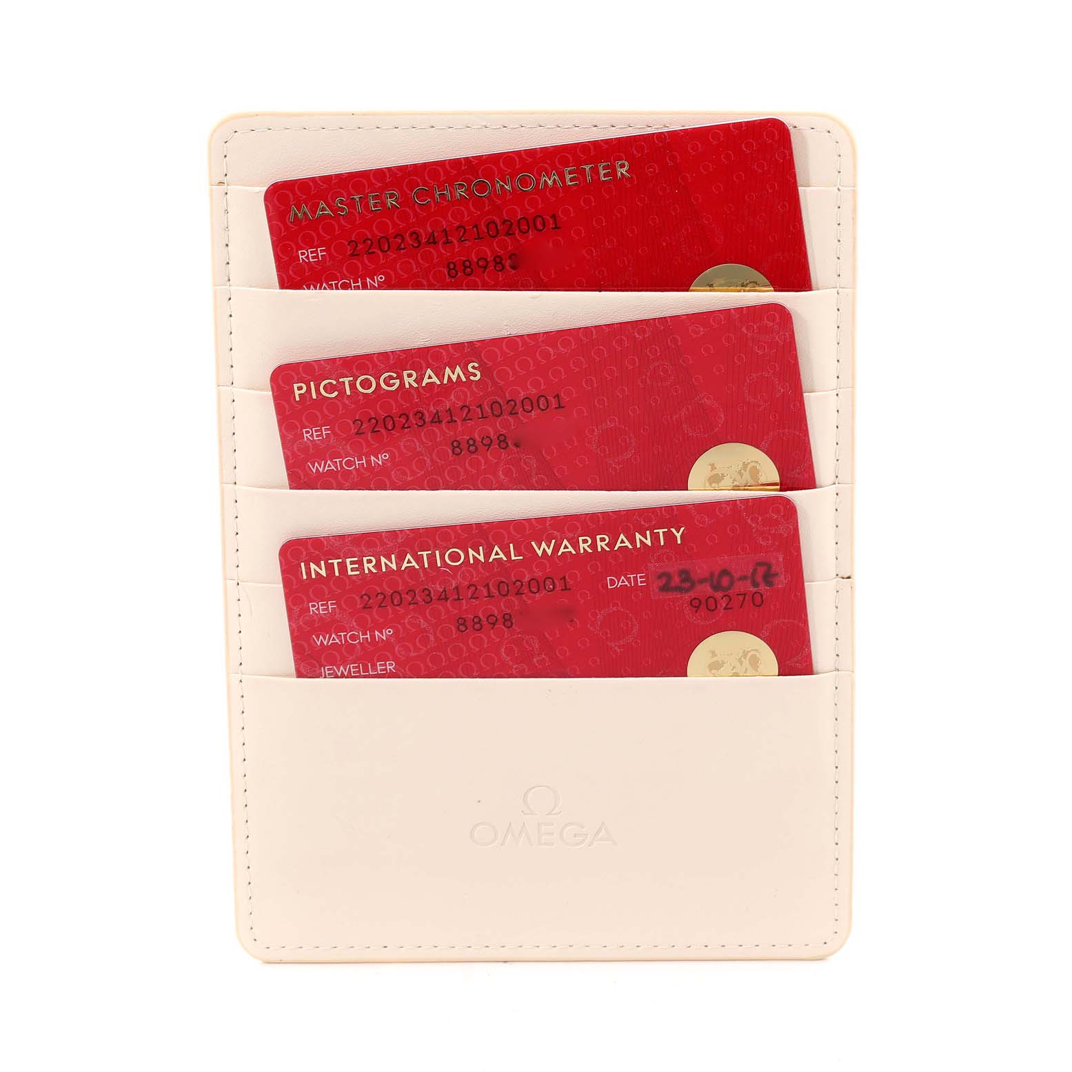 The image shows a cream cardholder with red certification and warranty cards for the Omega Aqua Terra 220.23.41.21.02.001 Men's Steel and Gold (two tone) Silver Dial 220.23.41.21.02.001 Men's Steel and Gold (two tone) Silver Dial model watch.