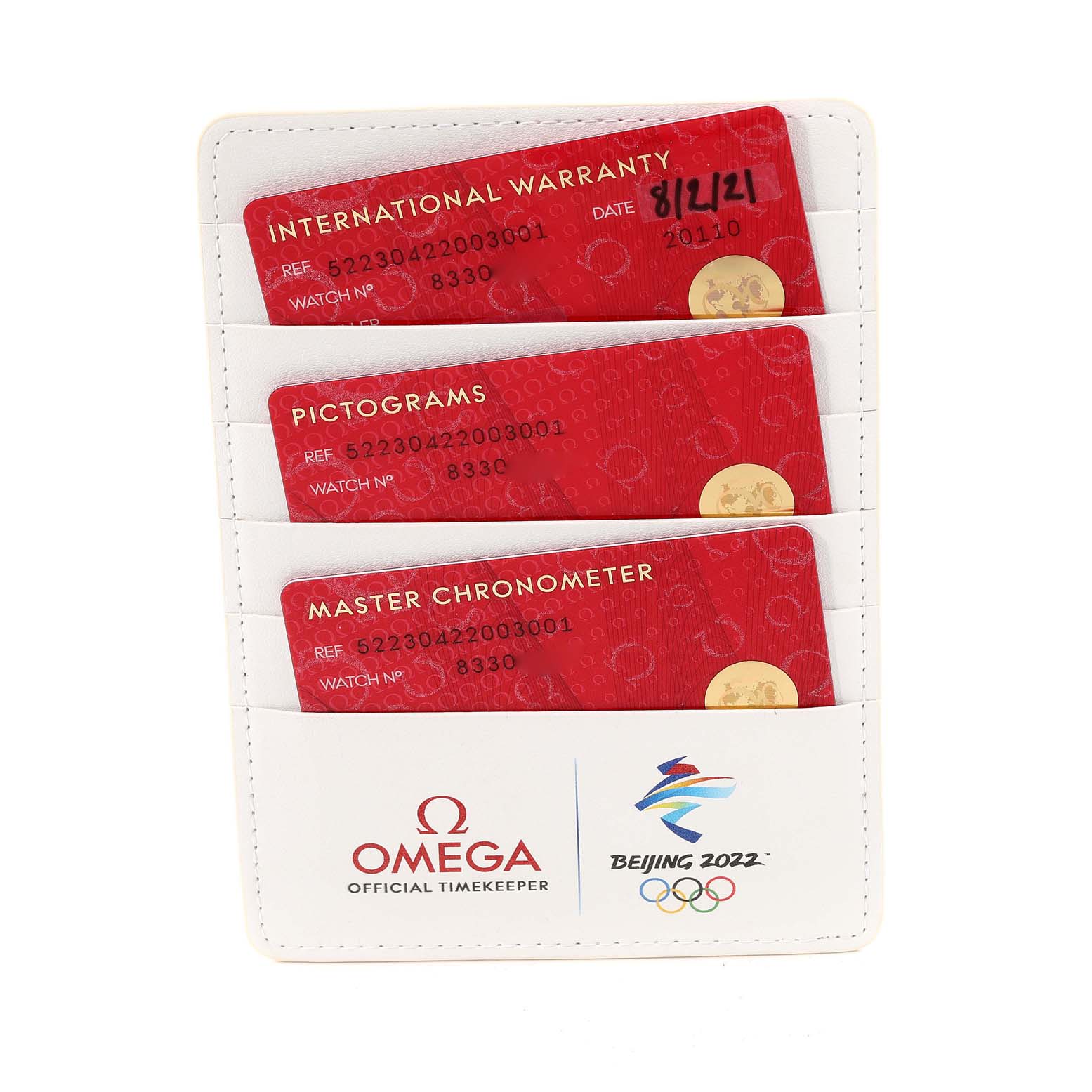 The image displays three red cards for the Omega Seamaster 522.30.42.20.03.001 Men
s Stainless Steel Blue Dial 522.30.42.20.03.001 Men
s Stainless Steel Blue Dial model: International Warranty, Pictograms, and Master Chronometer, in a white holder.