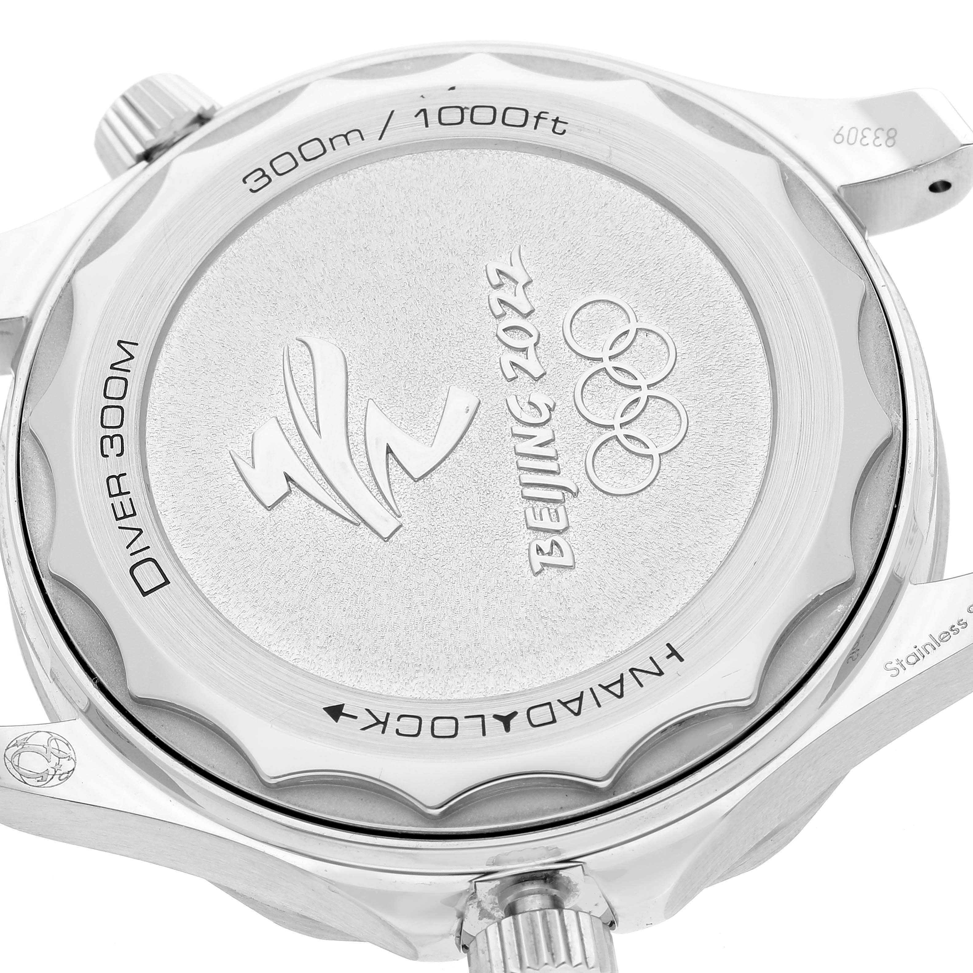 The image shows the case back of an Omega Seamaster 522.30.42.20.03.001 Men
s Stainless Steel Blue Dial 522.30.42.20.03.001 Men
s Stainless Steel Blue Dial watch, highlighting the "Diver 300M" and "Beijing 2022" engravings.