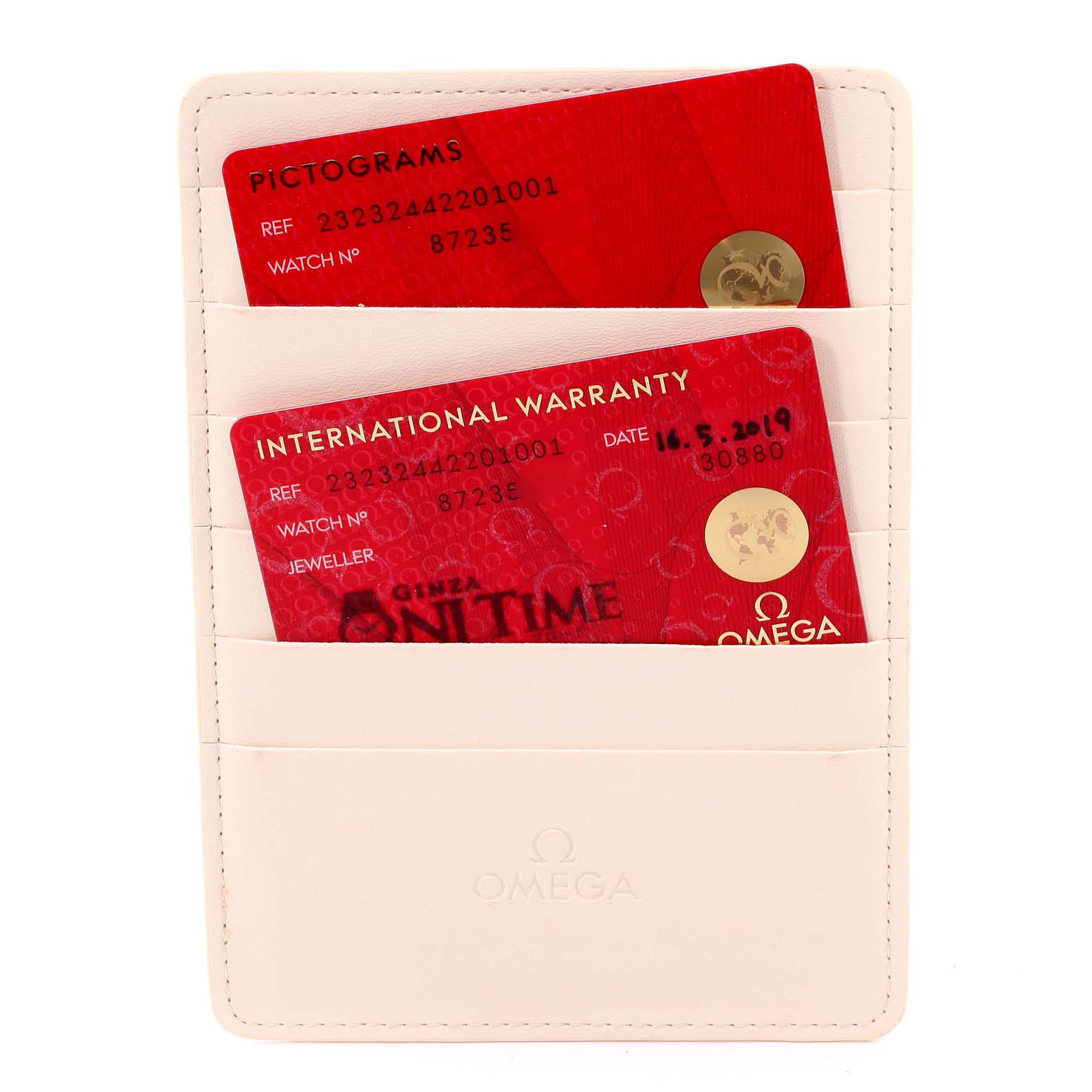 This image shows the warranty cards for the Omega Planet Ocean 232.30.44.22.01.001 Men's Stainless Steel Black Dial 232.30.44.22.01.001 Men's Stainless Steel Black Dial model, placed in a white cardholder.