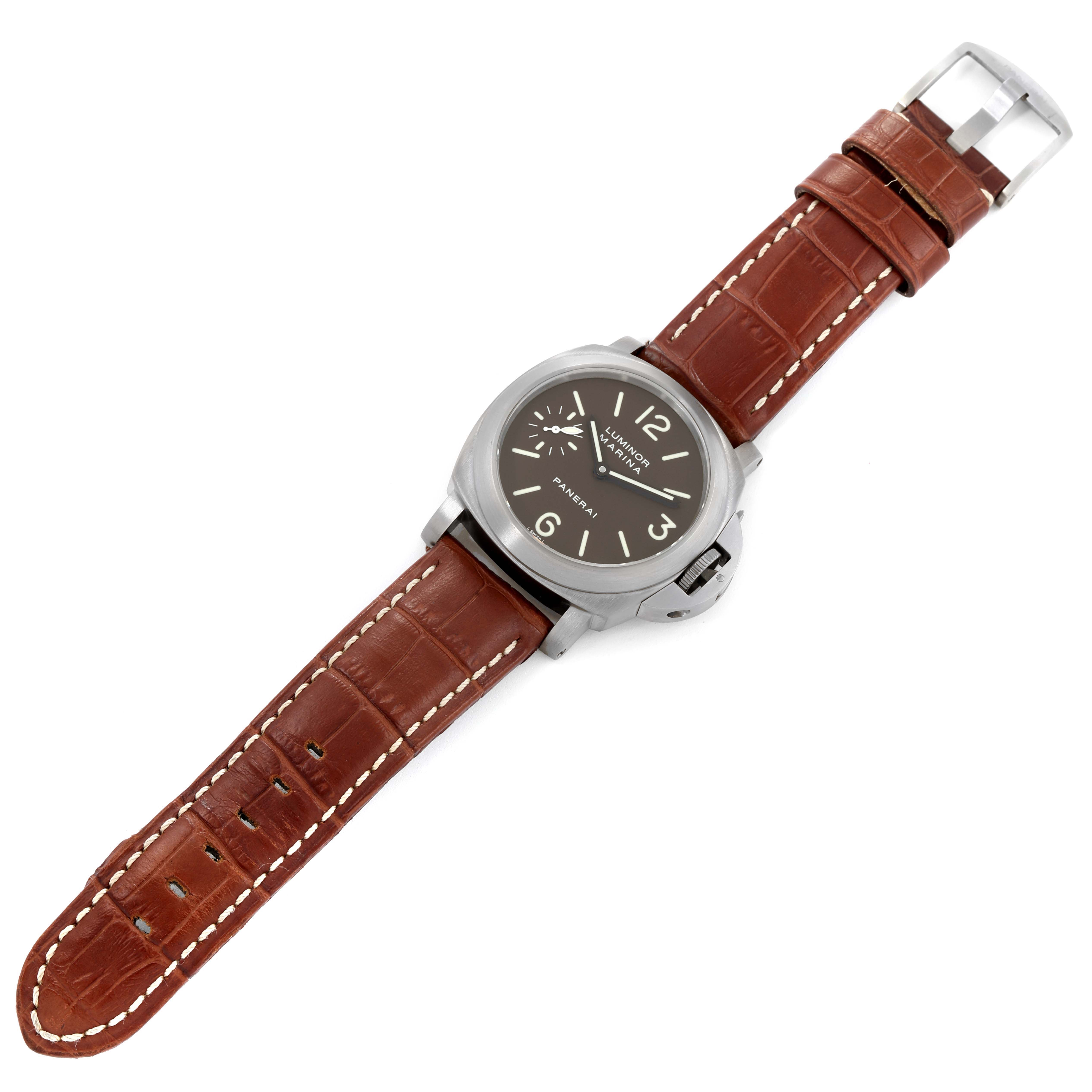 The Panerai Luminor PAM00118 Men's Titanium Brown Dial PAM00118 Men's Titanium Brown Dial watch is shown at an oblique angle, displaying its face, bezel, case, crown, and brown leather strap.