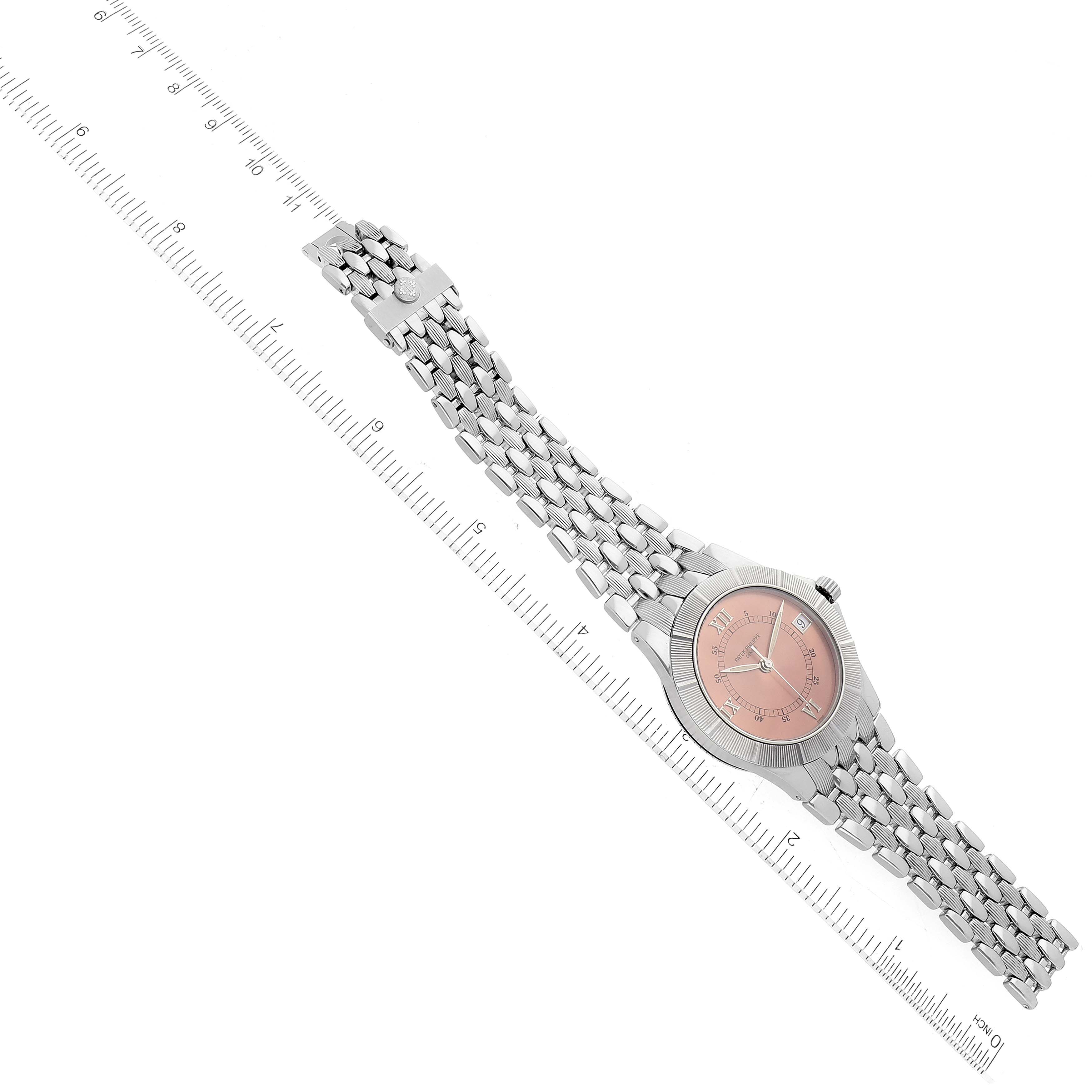 This image shows a Patek Philippe Neptune 5080/001 Men's Stainless Steel Brown Dial 5080/001 Men's Stainless Steel Brown Dial watch angled slightly to the left with its bracelet and dial fully visible, placed beside a ruler.