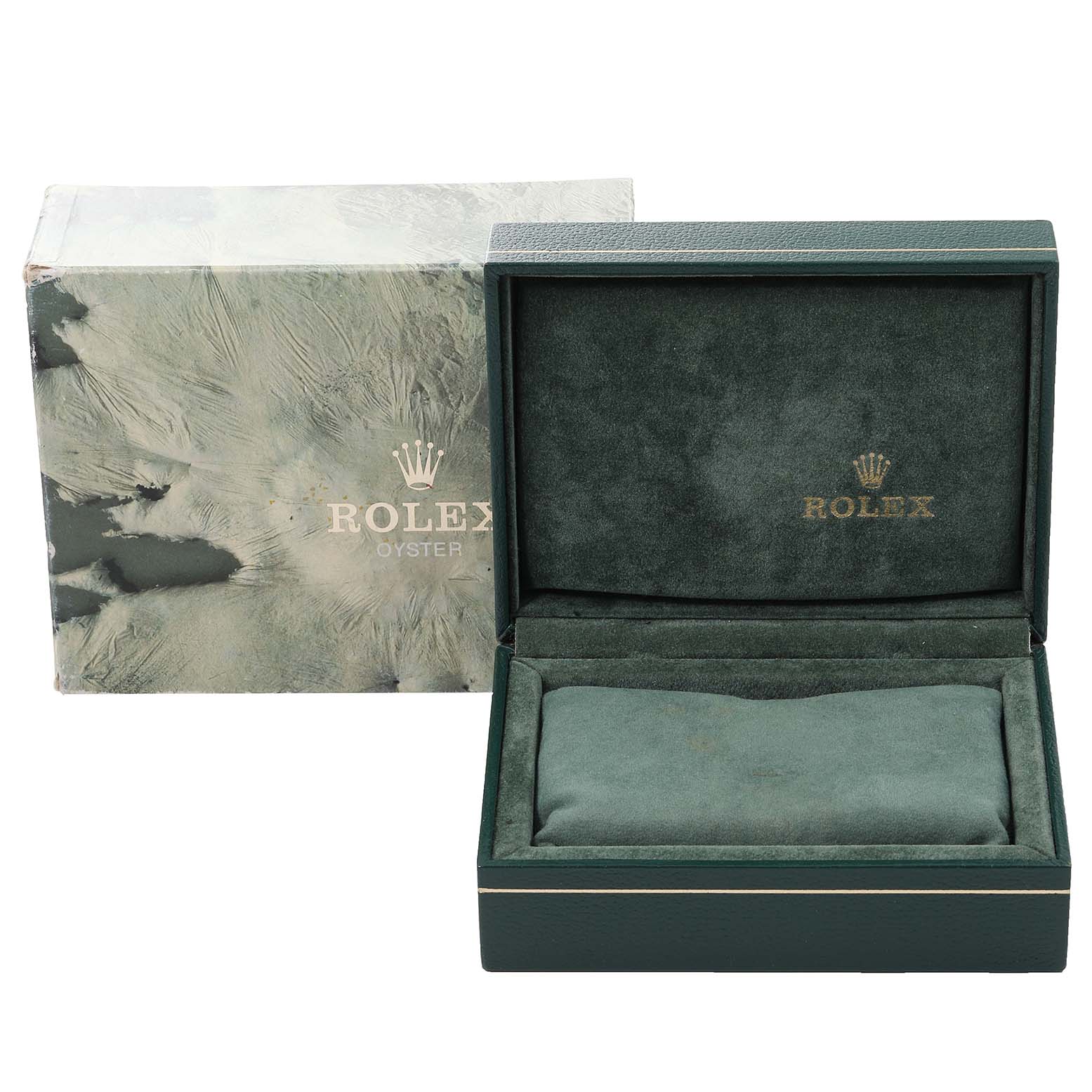 The image shows an empty green Rolex Date 15210 Men
s Stainless Steel Silver Dial 15210 Men
s Stainless Steel Silver Dial model watch box and its outer packaging, both featuring the Rolex logo.
