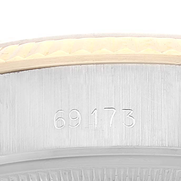 This is a close-up of the side casing of a Rolex Datejust 69173 Women's Steel and Gold (two tone) Champagne Dial 69173 Women's Steel and Gold (two tone) Champagne Dial watch, featuring the model number 69173.