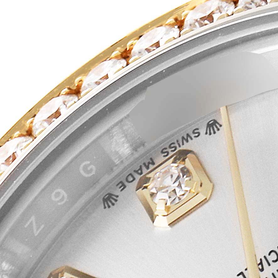 The image shows the upper part of the dial and diamond-studded bezel of a Rolex Datejust 279383 Women
s Steel and Gold (two tone) Silver Dial 279383 Women
s Steel and Gold (two tone) Silver Dial watch.
