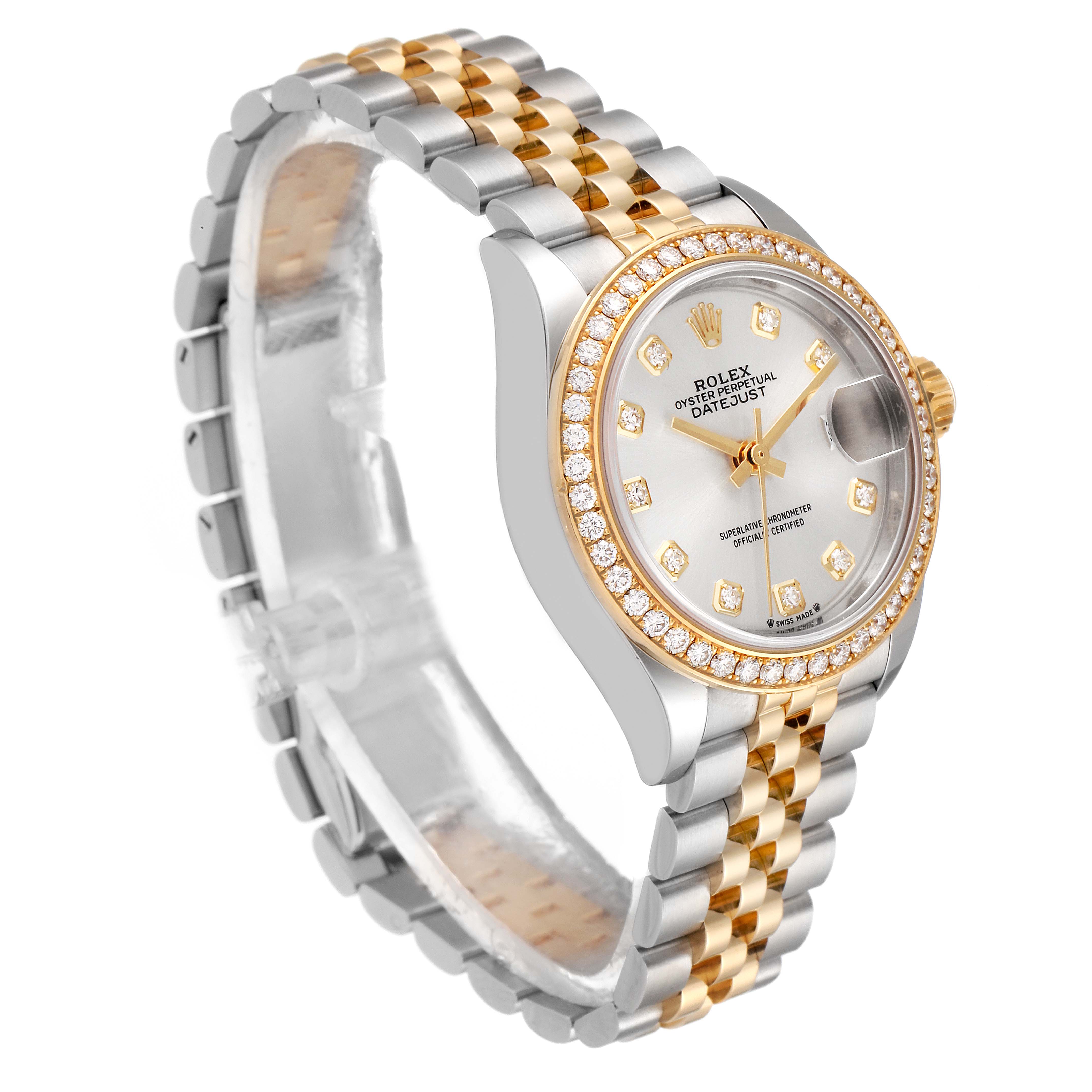 The Rolex Datejust 279383 Women
s Steel and Gold (two tone) Silver Dial 279383 Women
s Steel and Gold (two tone) Silver Dial watch is shown at a slight angle revealing the dial, bezel, crown, and the two-tone bracelet.