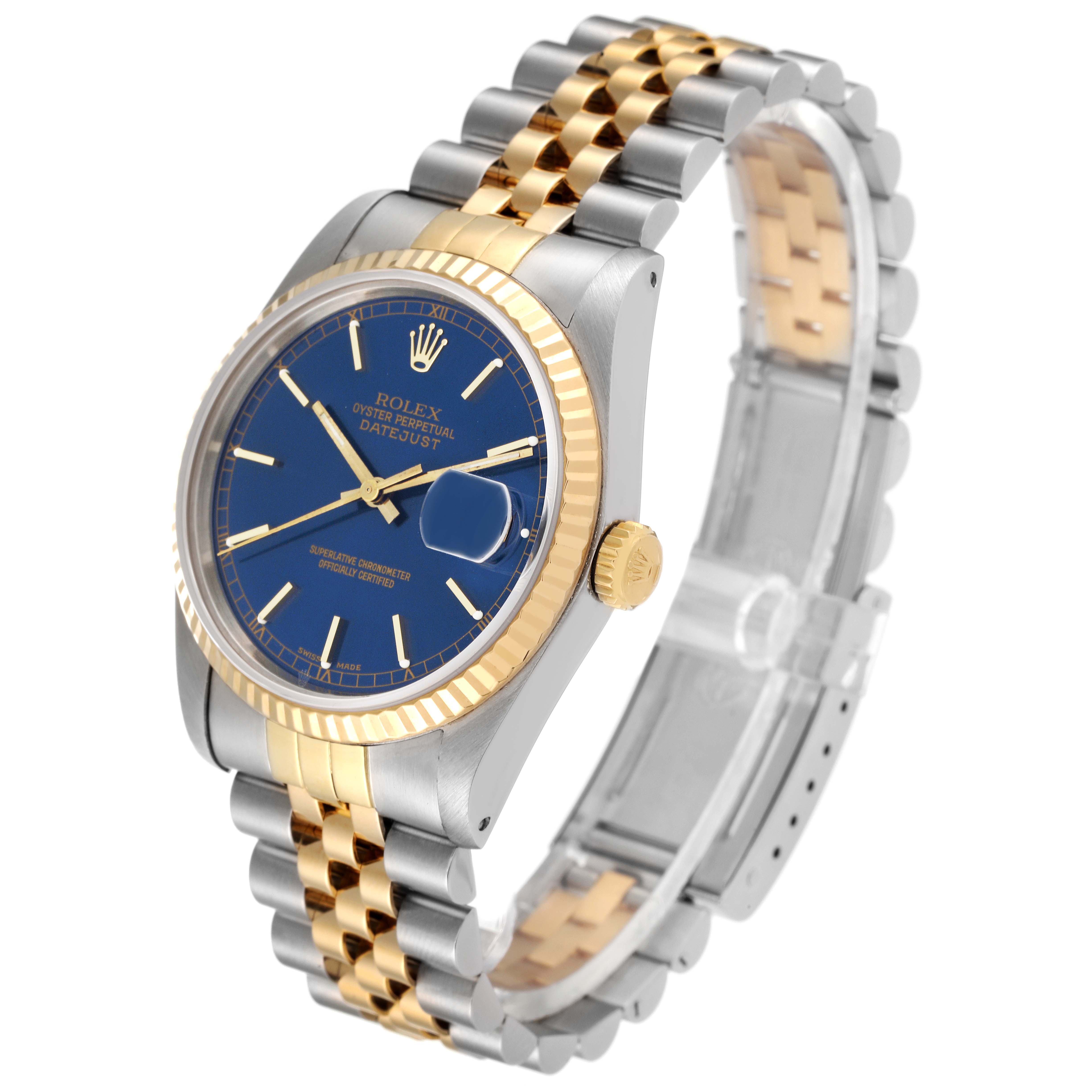 The image shows a Rolex Datejust 16233 Men's Steel and Gold (two tone) Blue Dial 16233 Men's Steel and Gold (two tone) Blue Dial watch at a three-quarter angle, highlighting its two-tone bracelet, blue dial, and gold fluted bezel.
